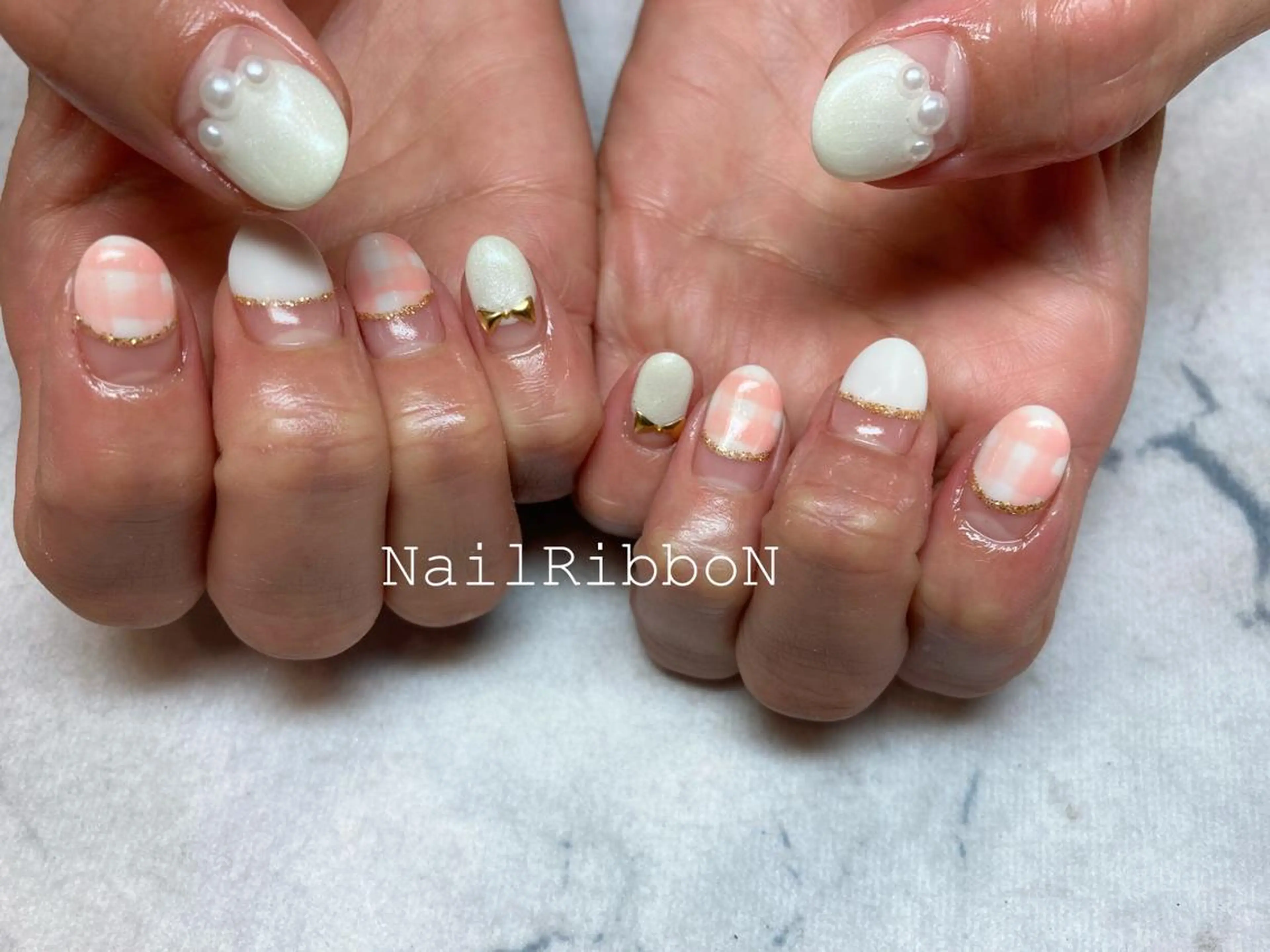 ネイル ネイルリボン 受付スタッフのネイルデザイン