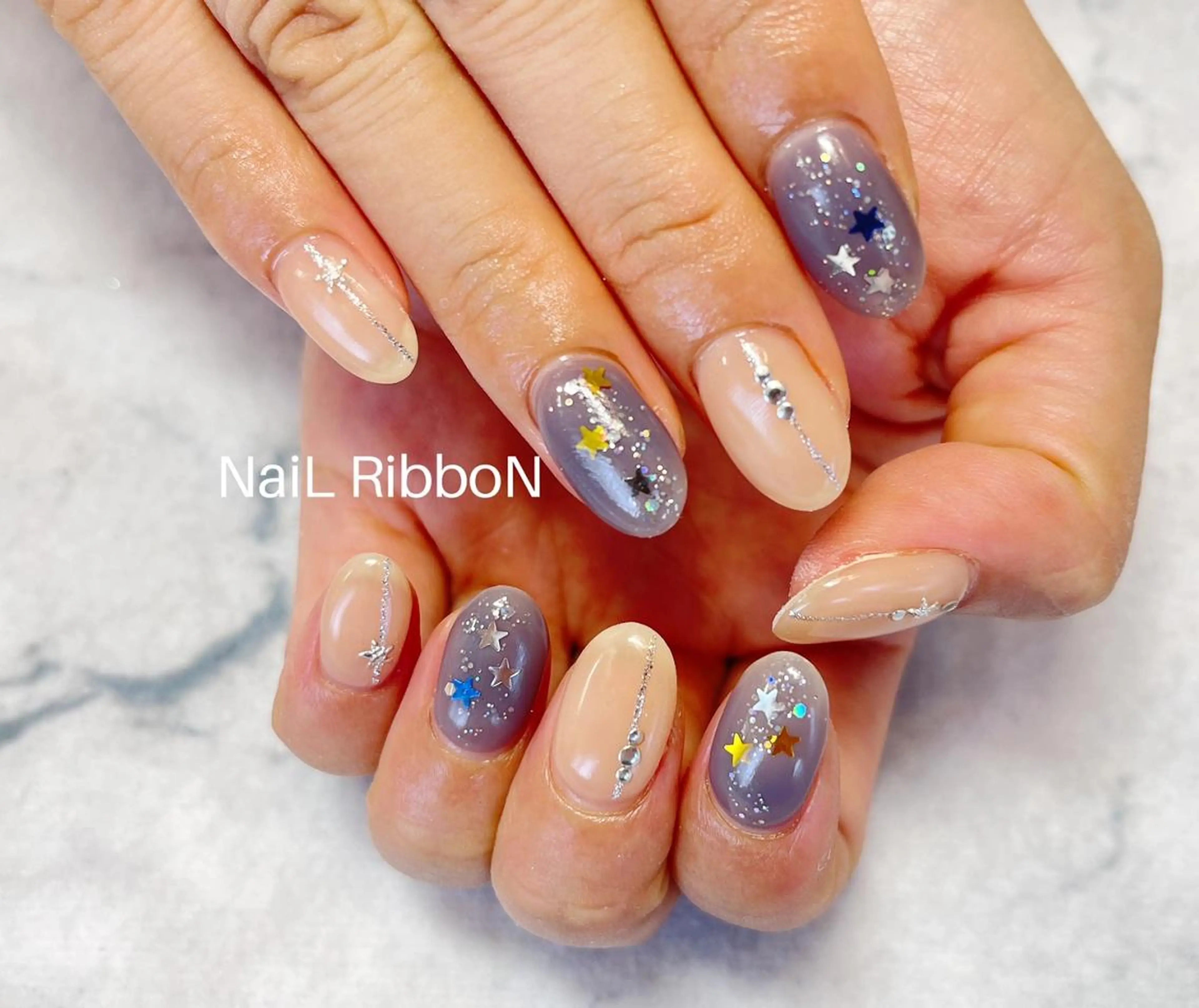 ネイル ネイルリボン 受付スタッフのネイルデザイン