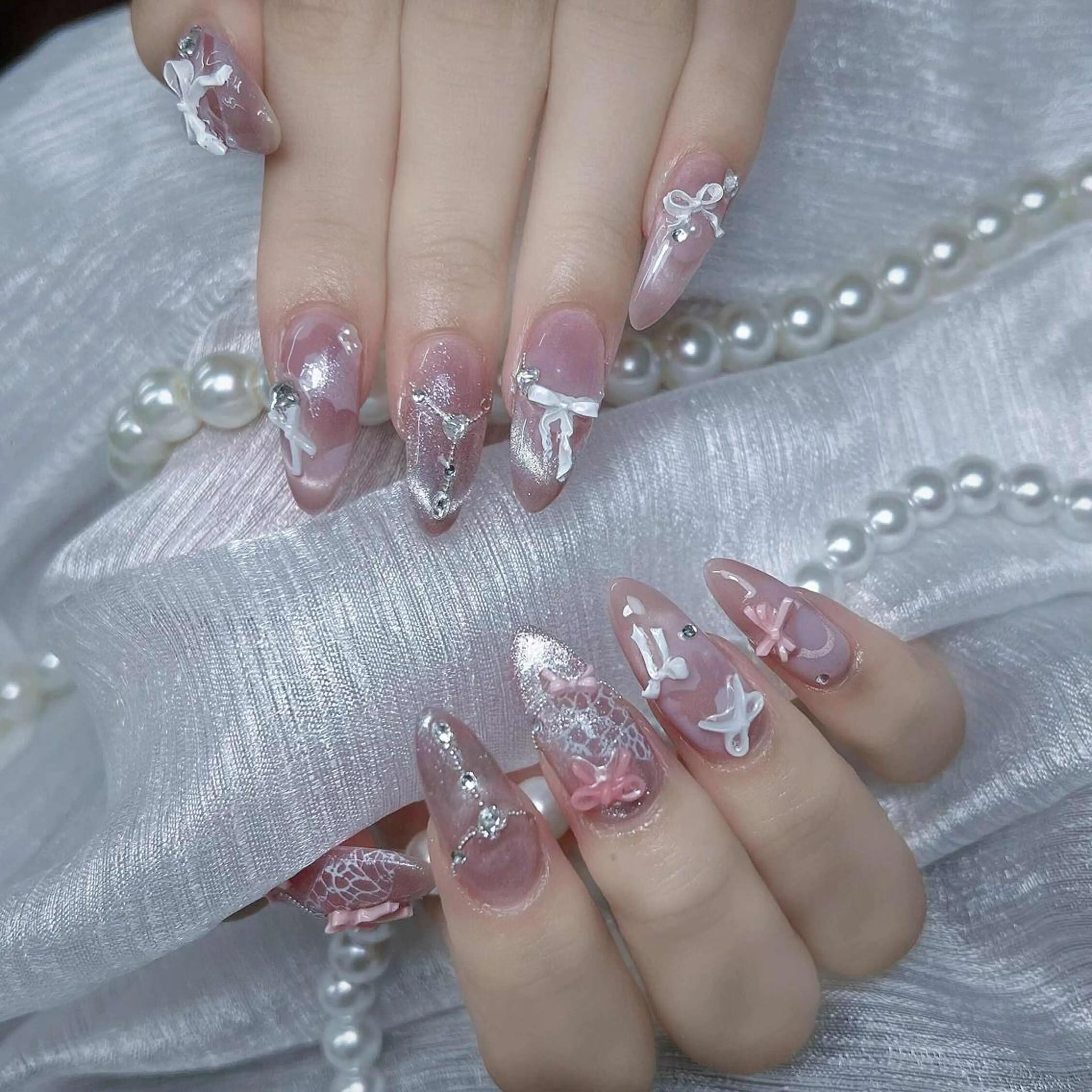 ネイル アートネイル ブラウン ジェルネイル ゴールド キラキラネイル Jerry Novaのネイルデザイン