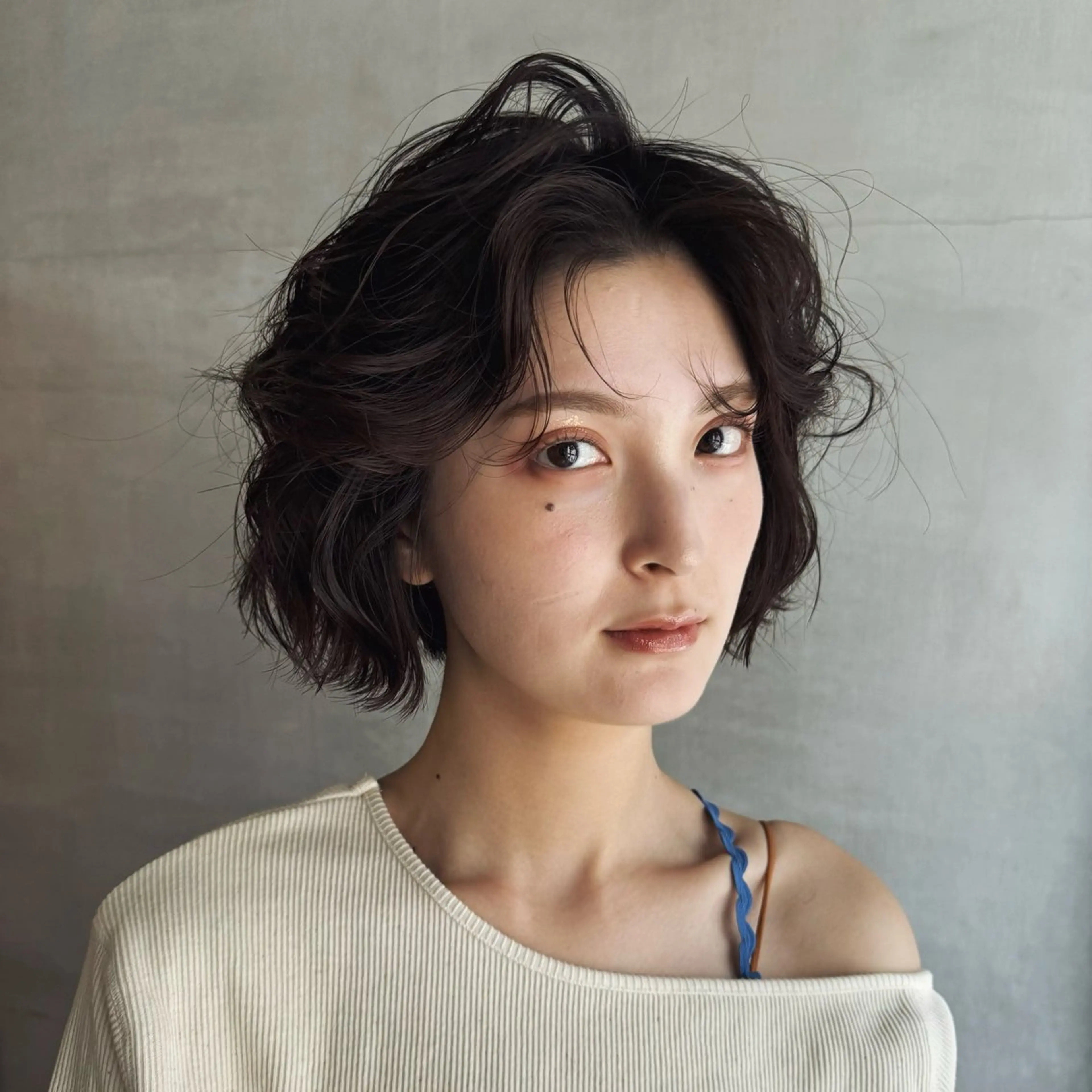 ミディアム パーマ ボブレイヤー ミディアムパーマ ボブ くせ毛 顔まわりレイヤー Neelu 日置剛人のヘアスタイル