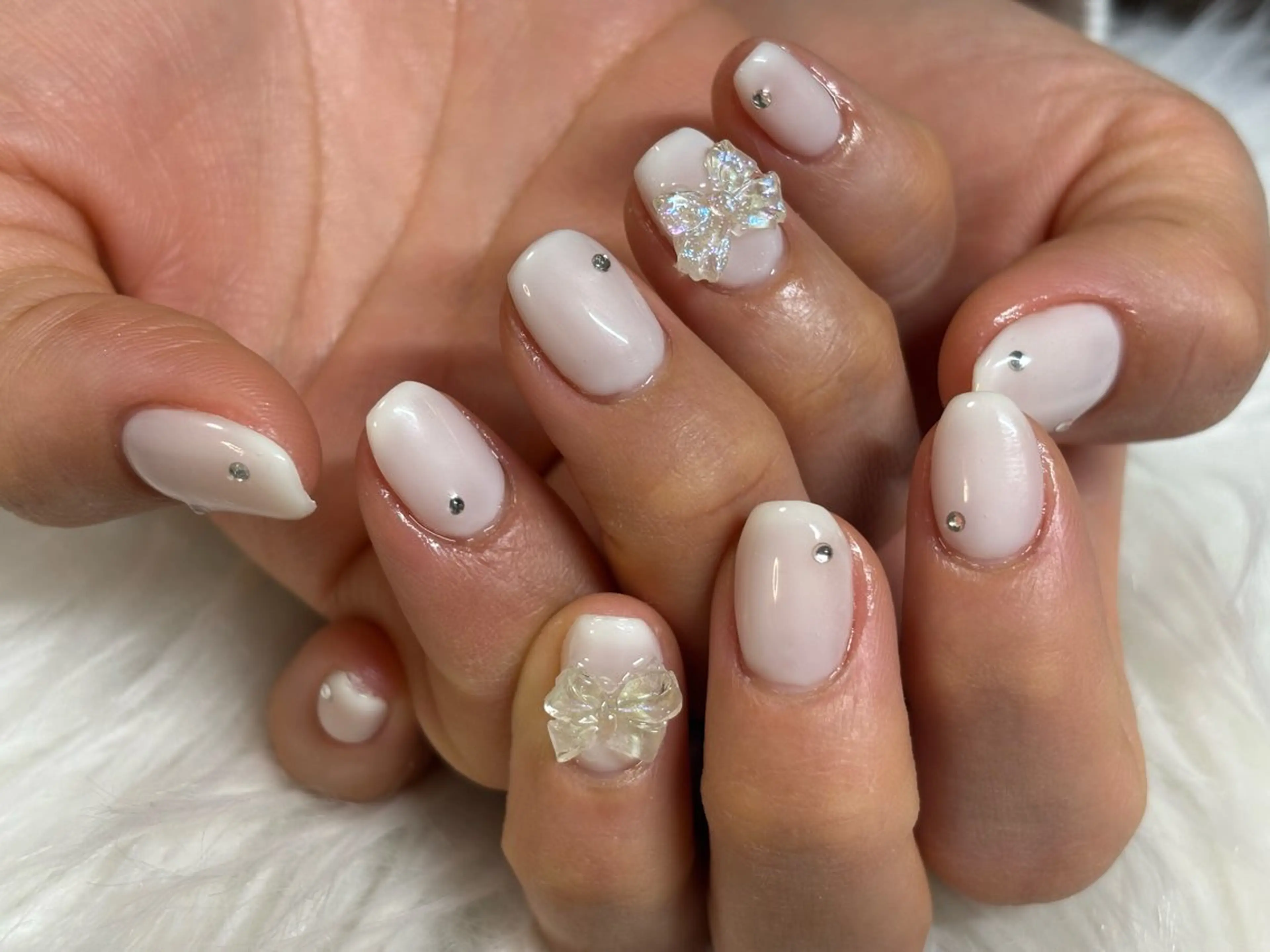 ネイル リボン ホワイト よもぎ蒸し・ワンカラ ー専門 しゅくるのその他イメージ