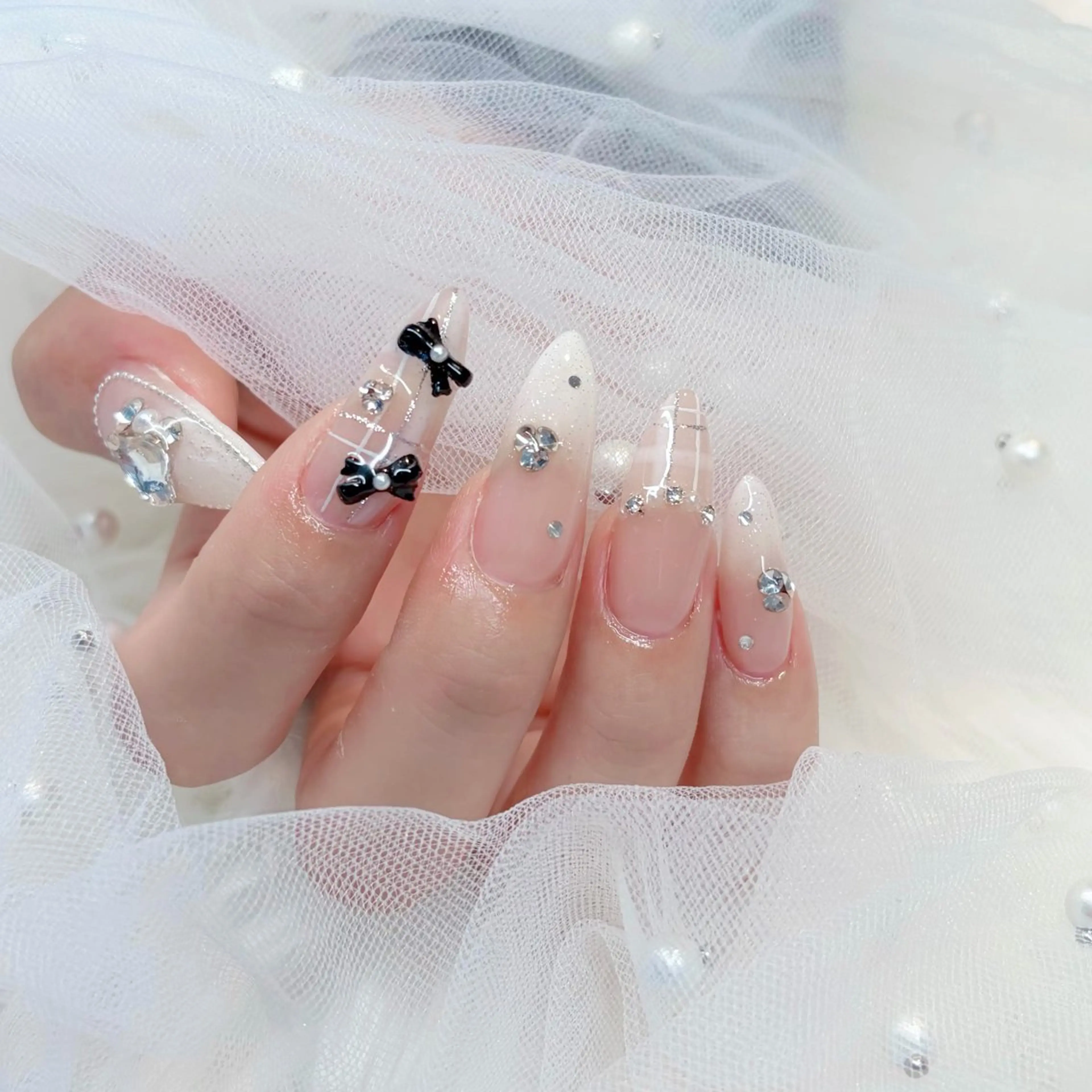 ネイル リボン ワンホンネイル ハンドネイル ぷりゅねる 心斎橋のネイルデザイン