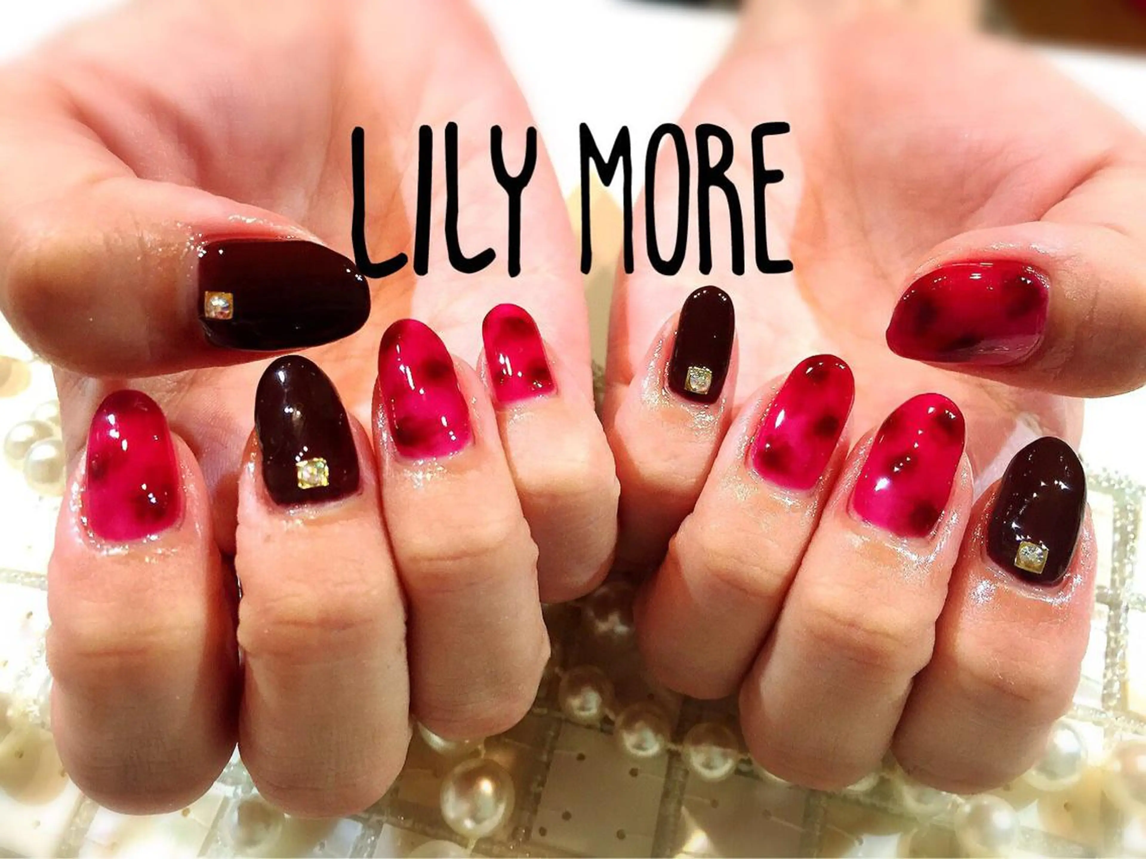 ネイル べっ甲ネイル 赤色 Lily closetのネイルデザイン