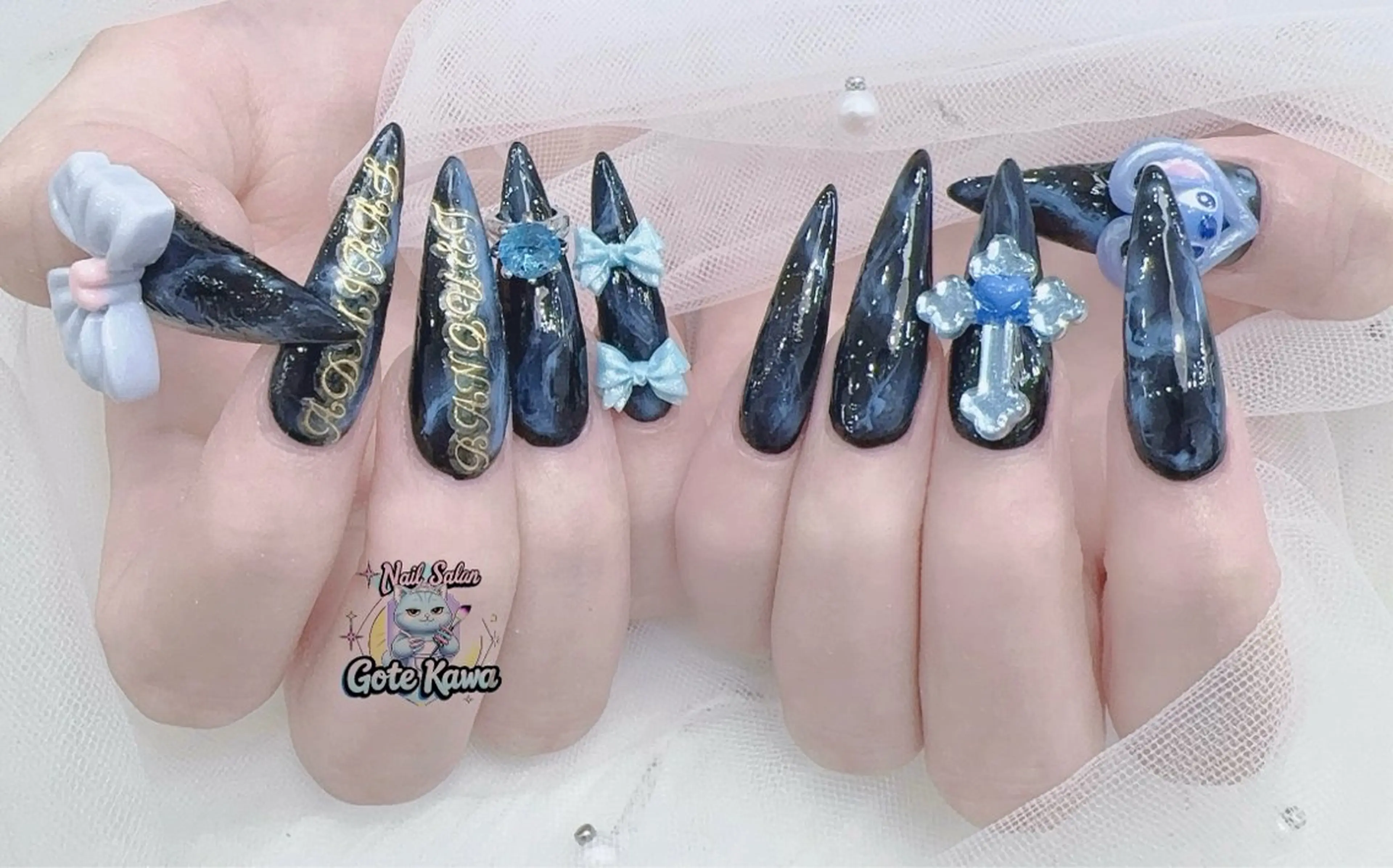 ネイル アートネイル 長さ出し キラキラネイル ピンク リボン Gote Kawa nail salonのネイルデザイン
