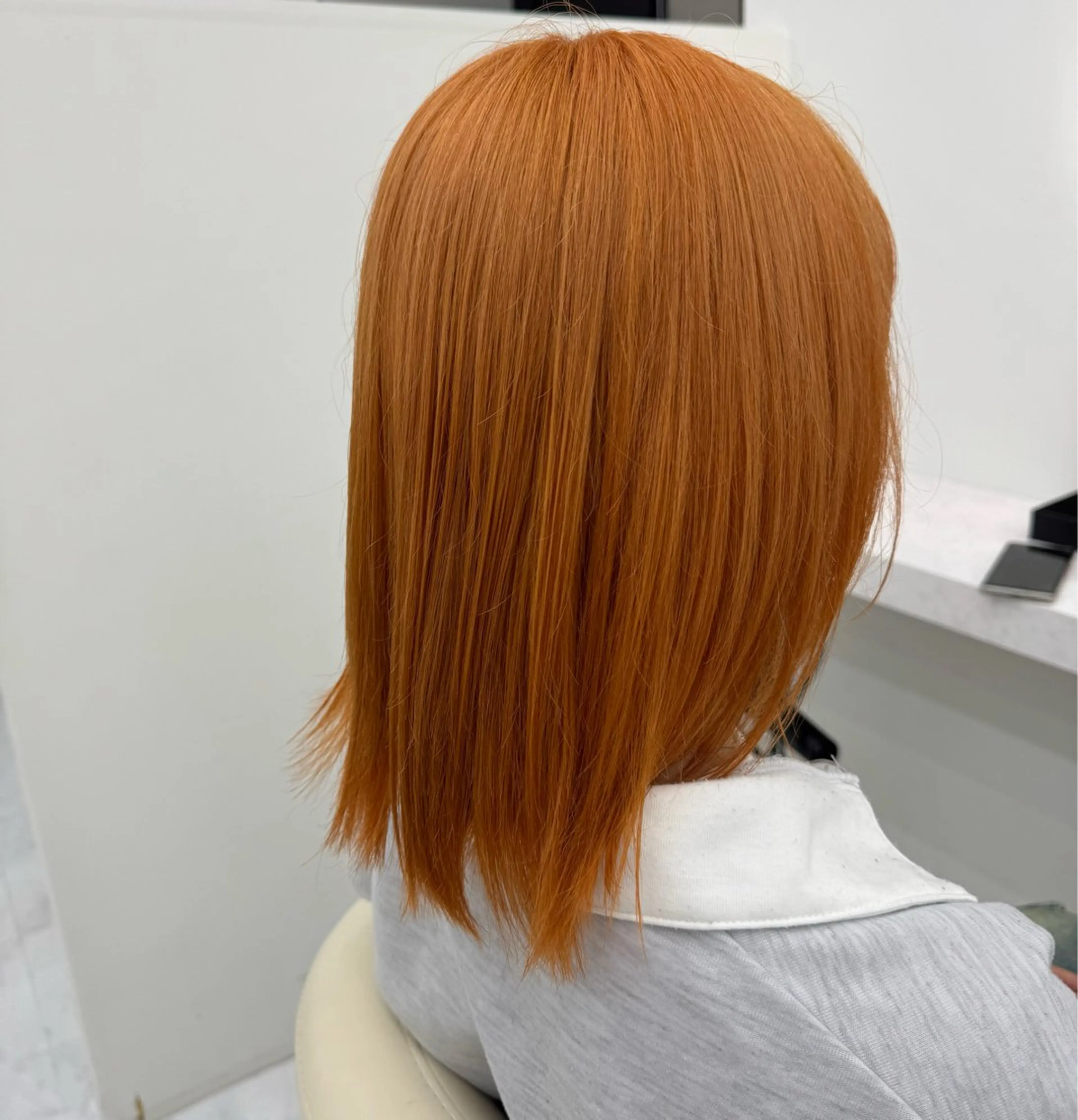 カラー ブリーチ オレンジ ヘアカラー トリートメント 三浦 菜桜のヘアスタイル