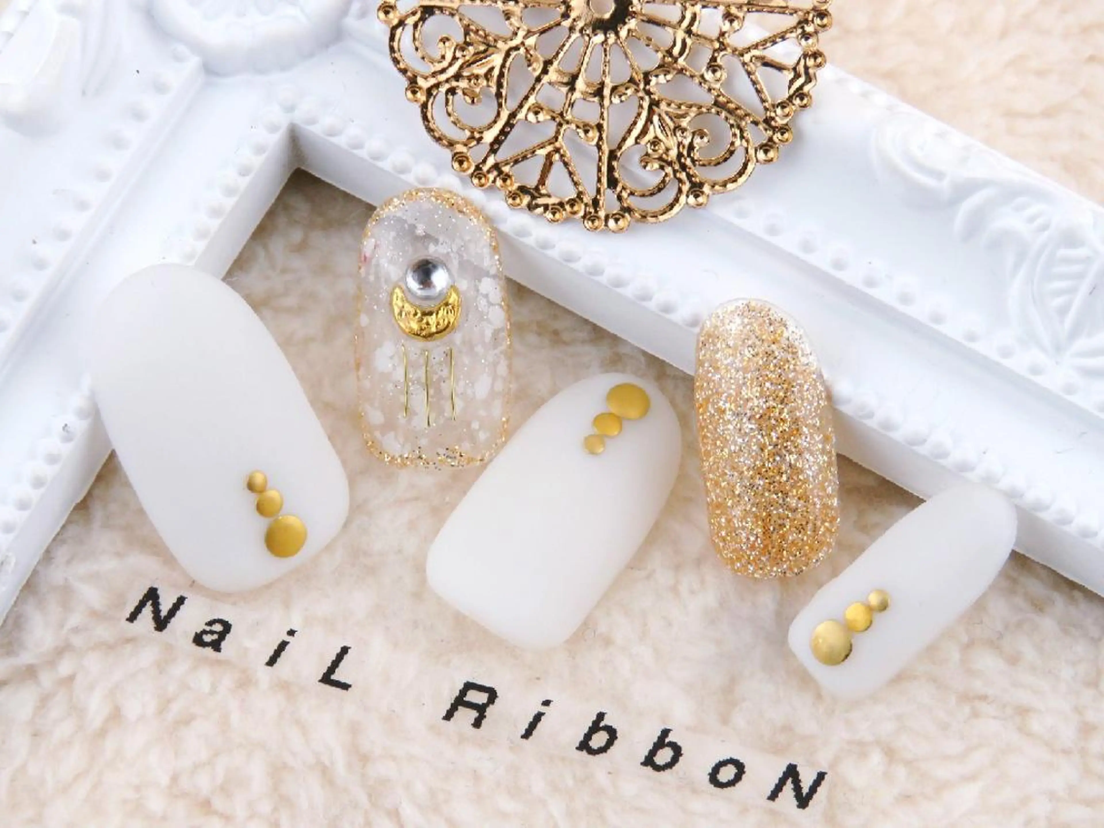 ネイル ネイルリボン 受付スタッフのネイルデザイン