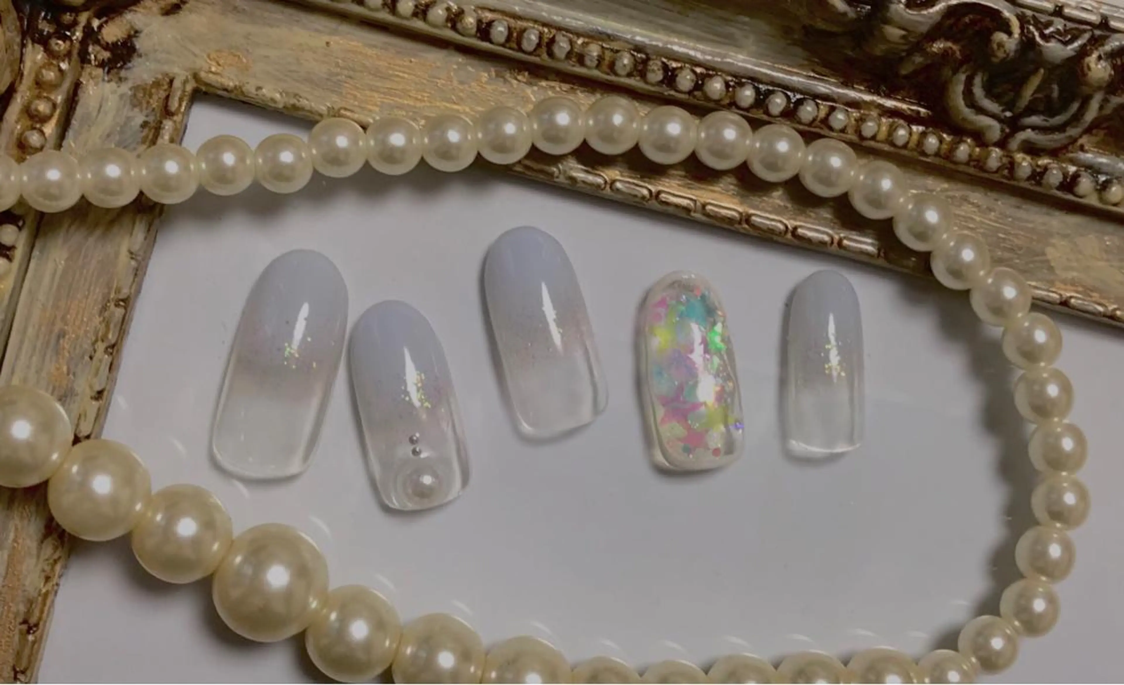 ネイル 水色 ハンドネイル 'mm  (ミリ) ＭＡＮＡＭＩのネイルデザイン