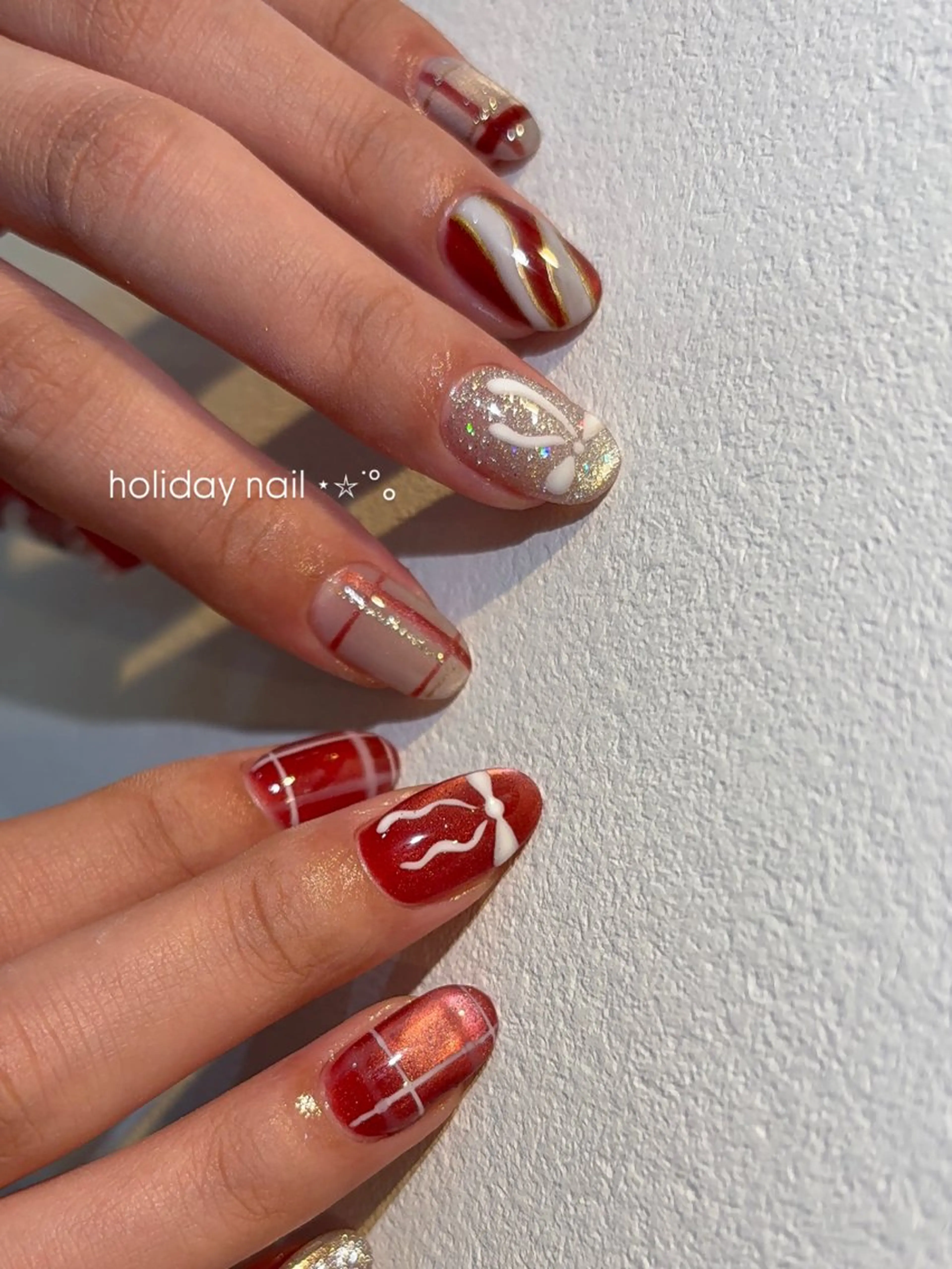 ネイル マグネットネイル リボン 冬ネイル クリスマス ハンドネイル Belle　Nail 【haluca】のネイルデザイン