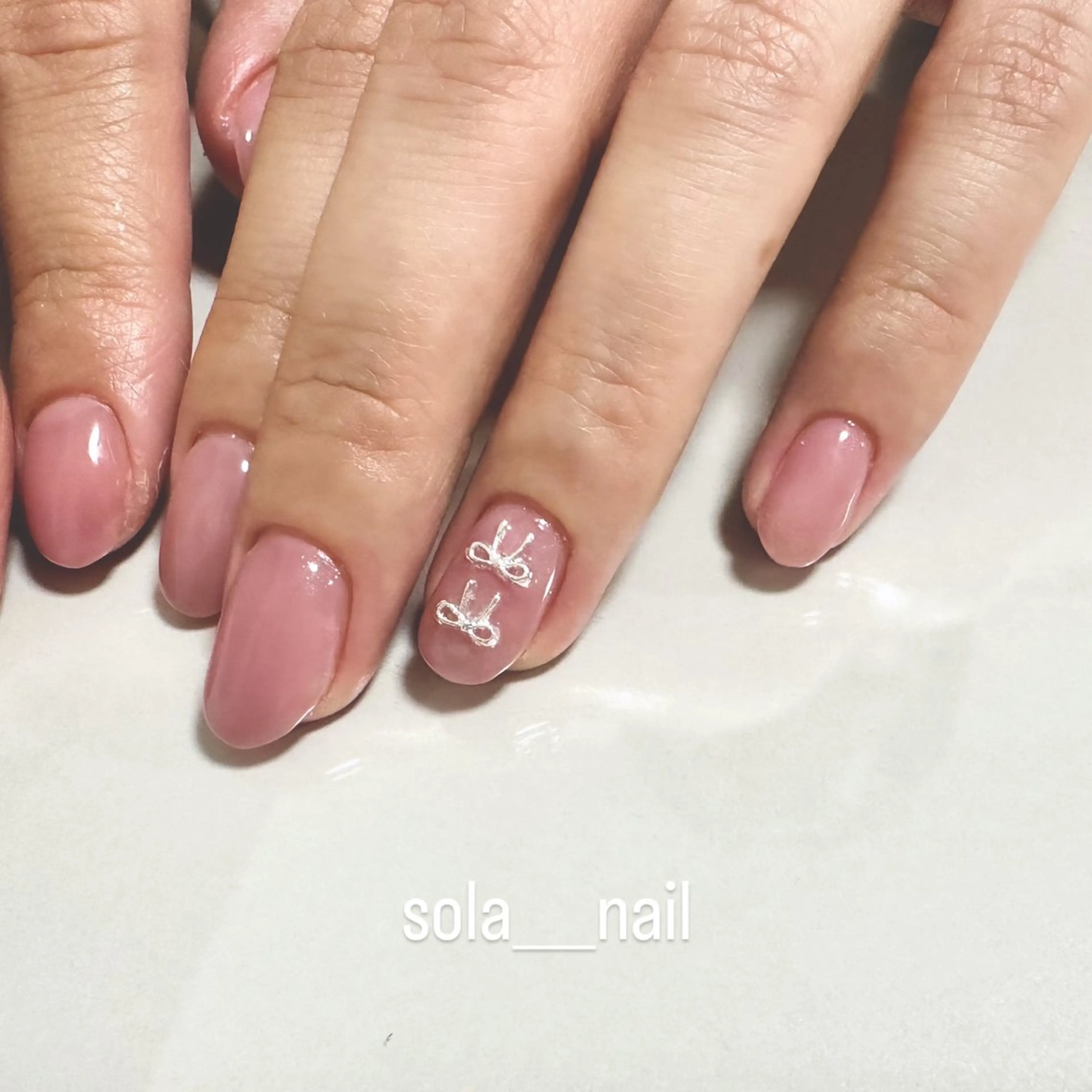 ネイル オフィスネイル ピンク リボン sola nailのネイルデザイン