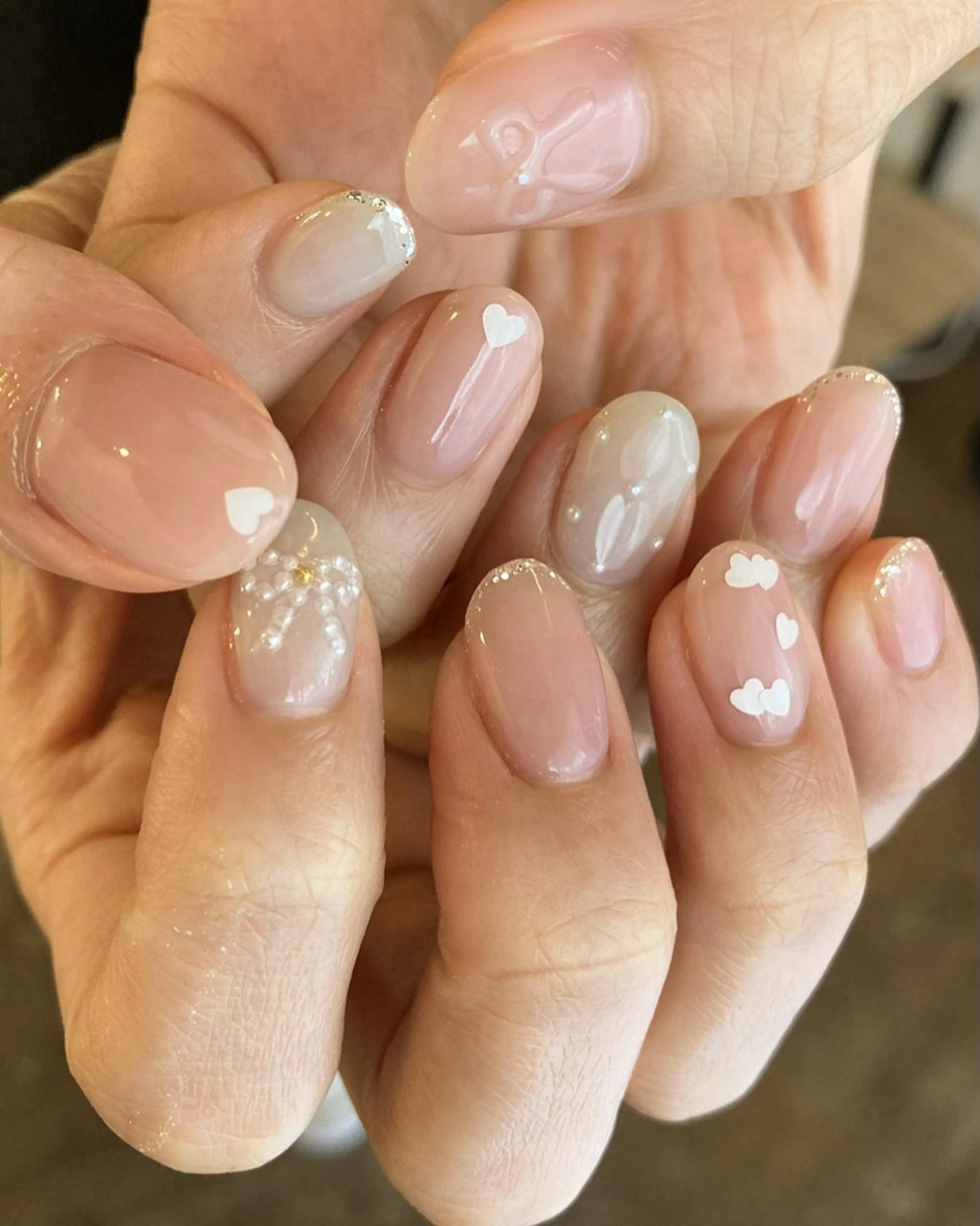 ネイル ハート リボン ハンドネイル DEEP nail salon所属・DEEP nail salonのネイルデザイン