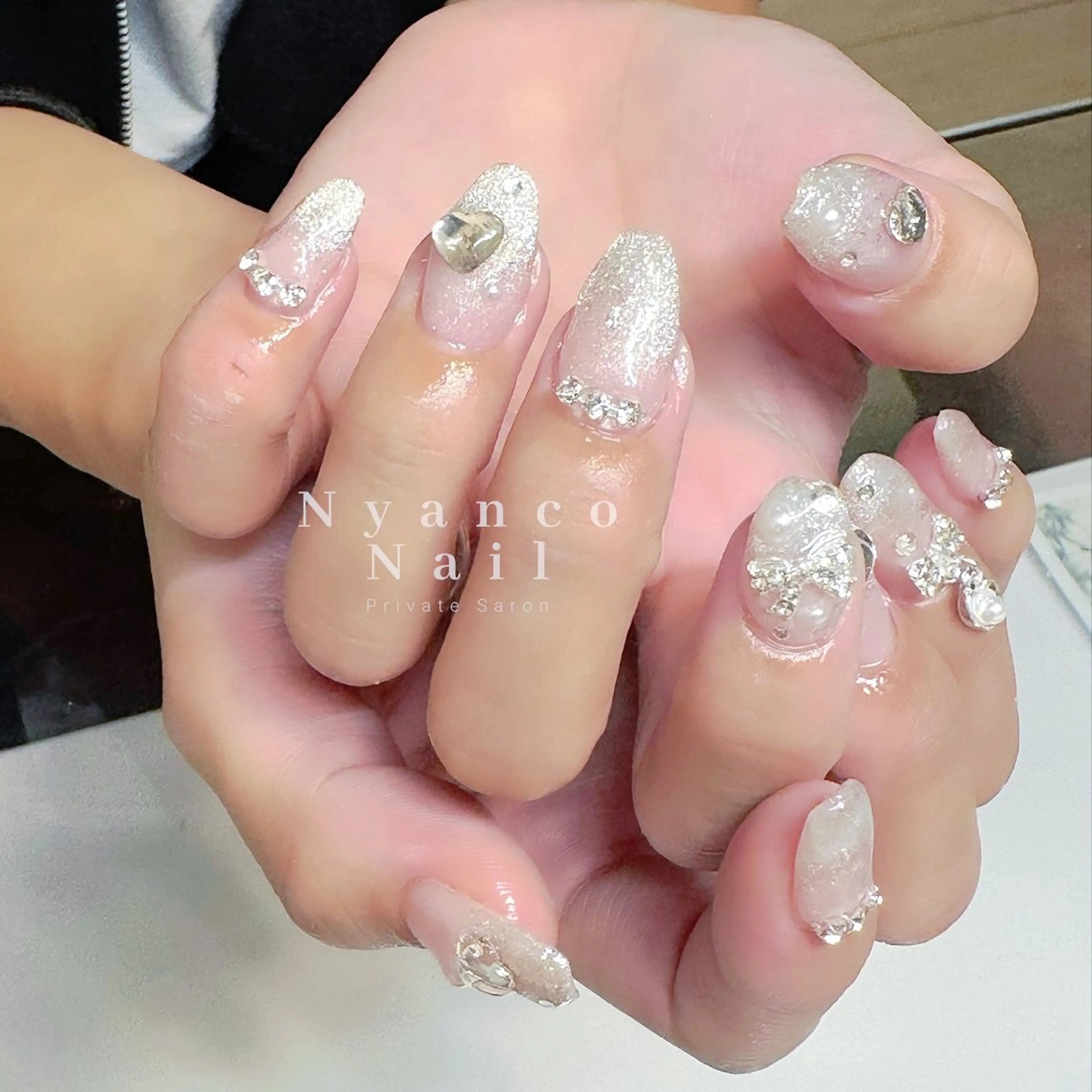 ネイル ジェルネイル グラデーション キラキラネイル マグネットネイル リボン Nyanco Nailのネイルデザイン