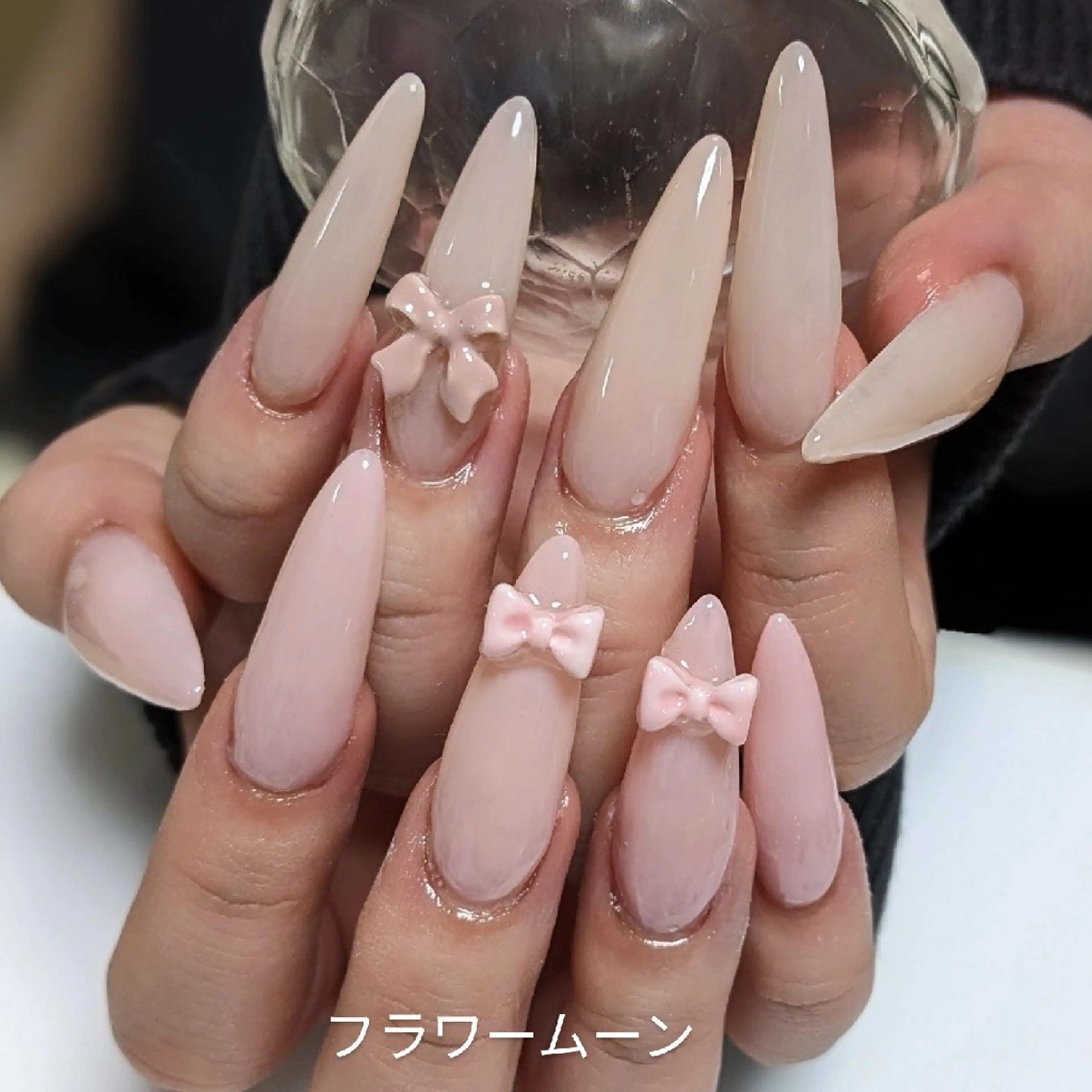 ネイル ピンク リボン ハンドネイル ハンドケア フラワー ムーンのネイルデザイン