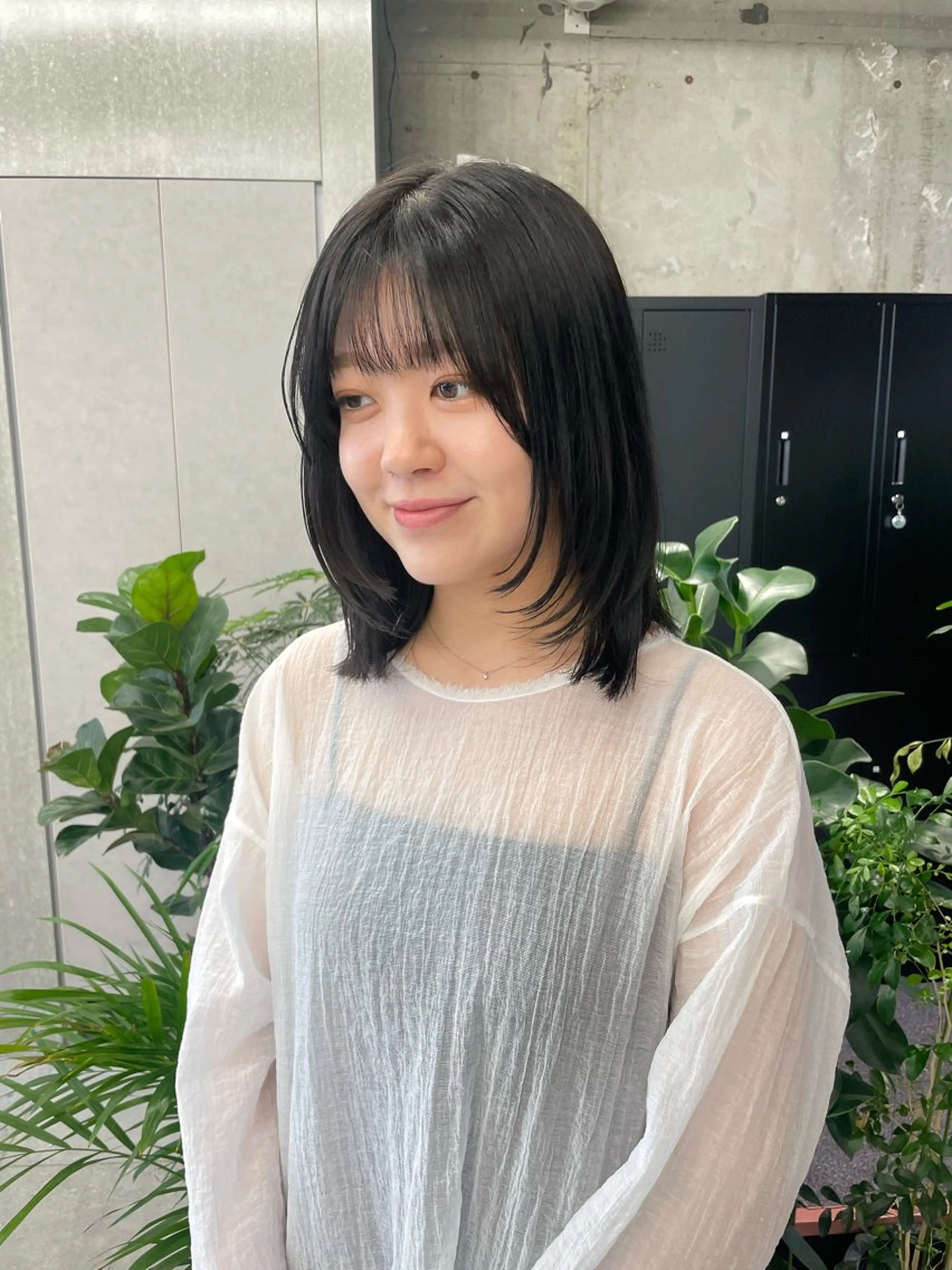 ミディアム MIFA レイヤー／パーマのヘアスタイル