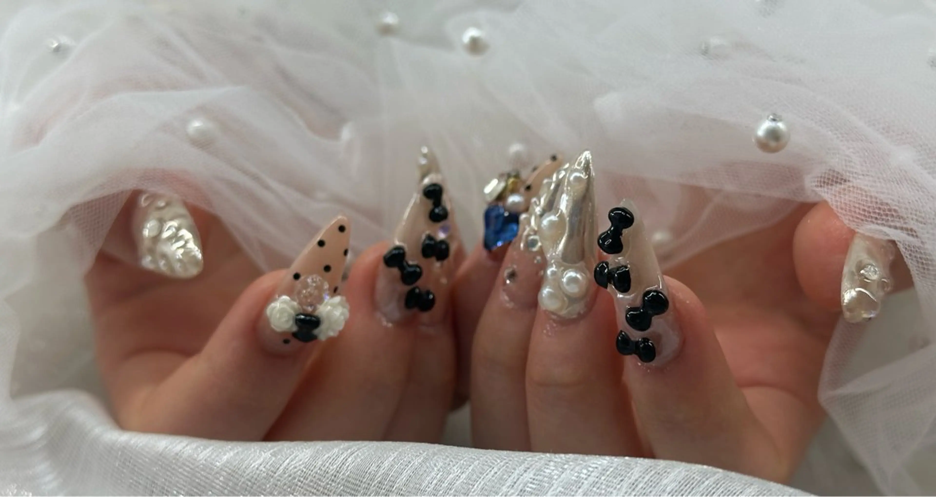 ネイル ハンドネイル 渋谷T&B りお ロング無制限中💫のネイルデザイン