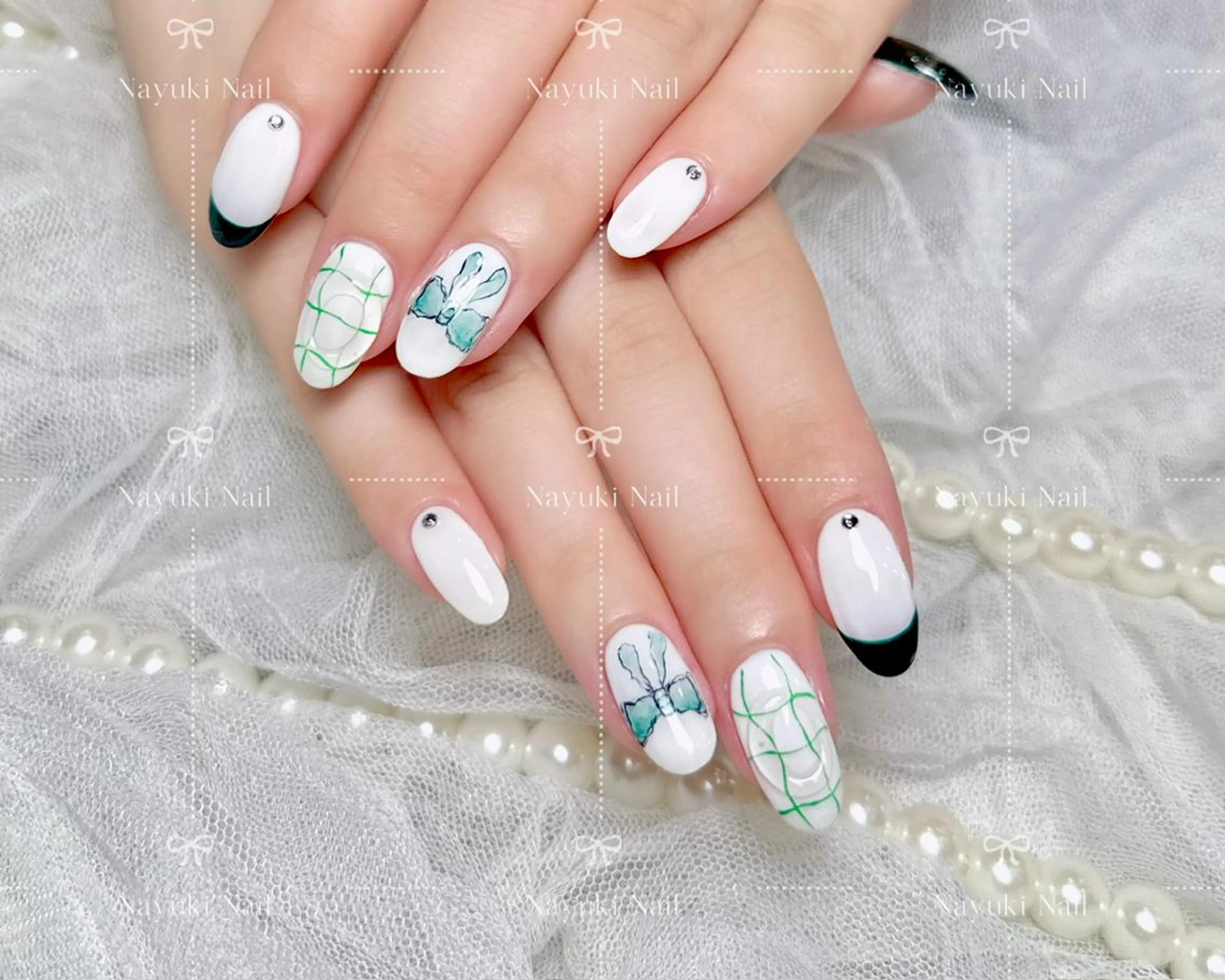 ネイル 🦋 Queenieのネイルデザイン