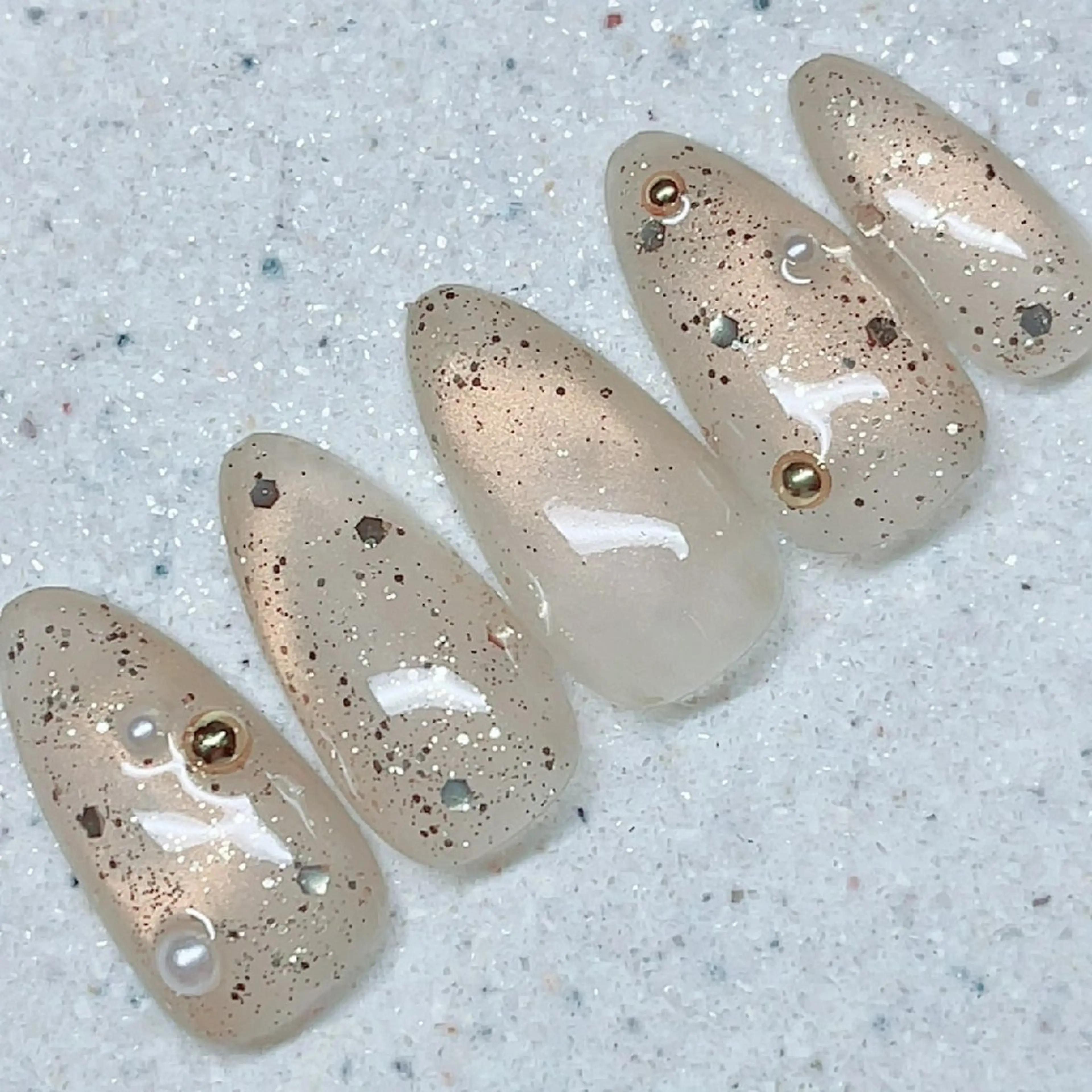 シャンパンゴールドマグネットネイル【リピーター様¥6,300】の写真