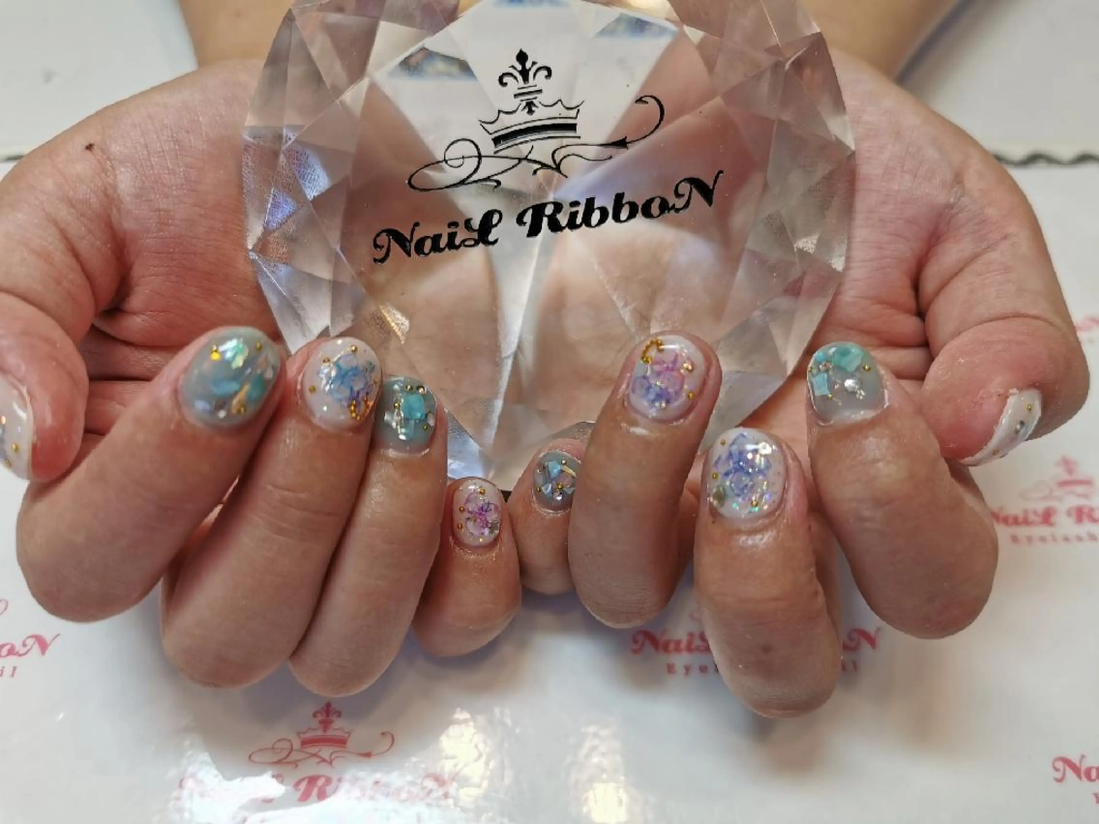 ネイル ネイルリボン 受付スタッフのネイルデザイン