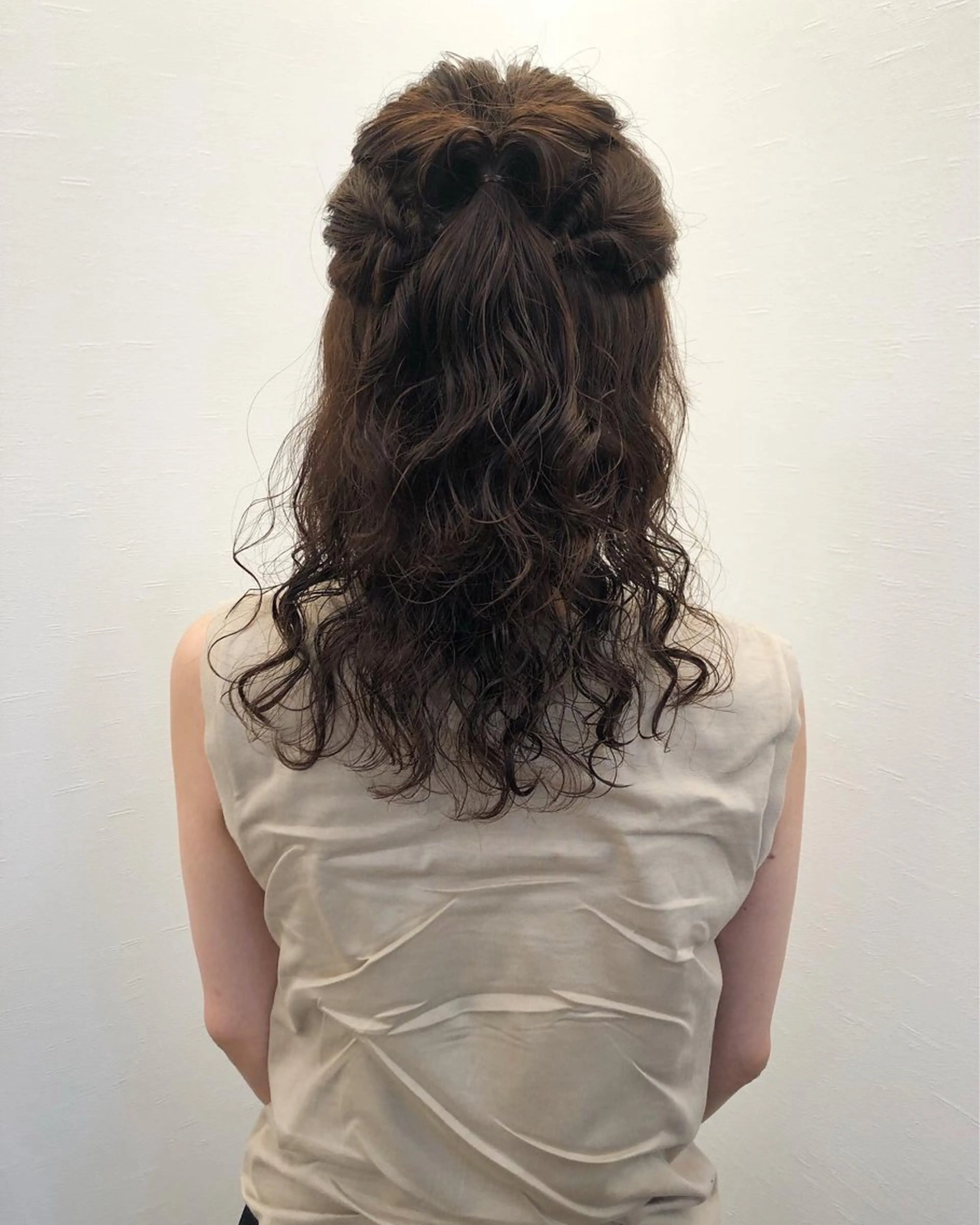 パーマ ツノガイ エリのヘアスタイル