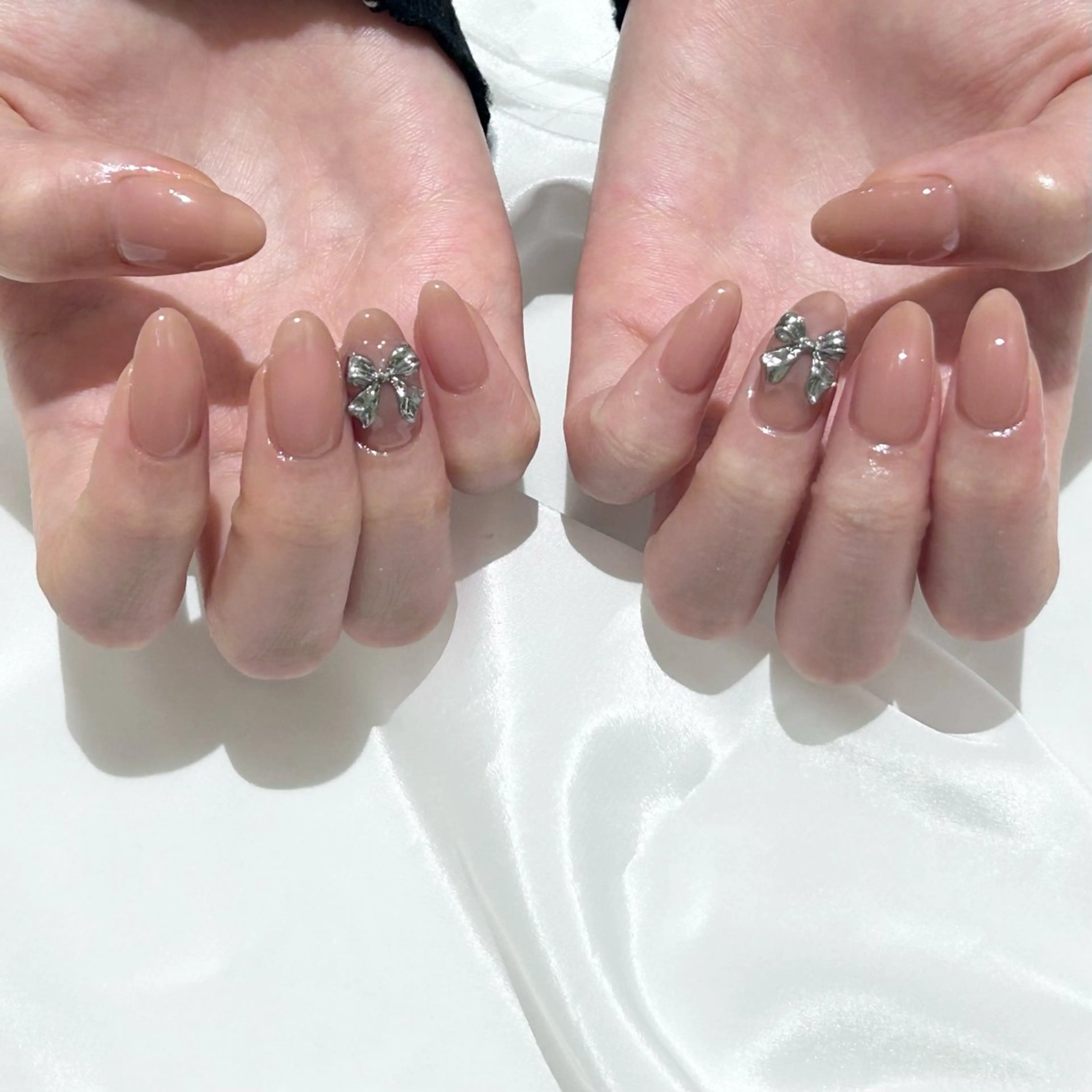 ネイル リボン ハンドネイル 𝗮𝗶𝗿𝗶 🌙のネイルデザイン