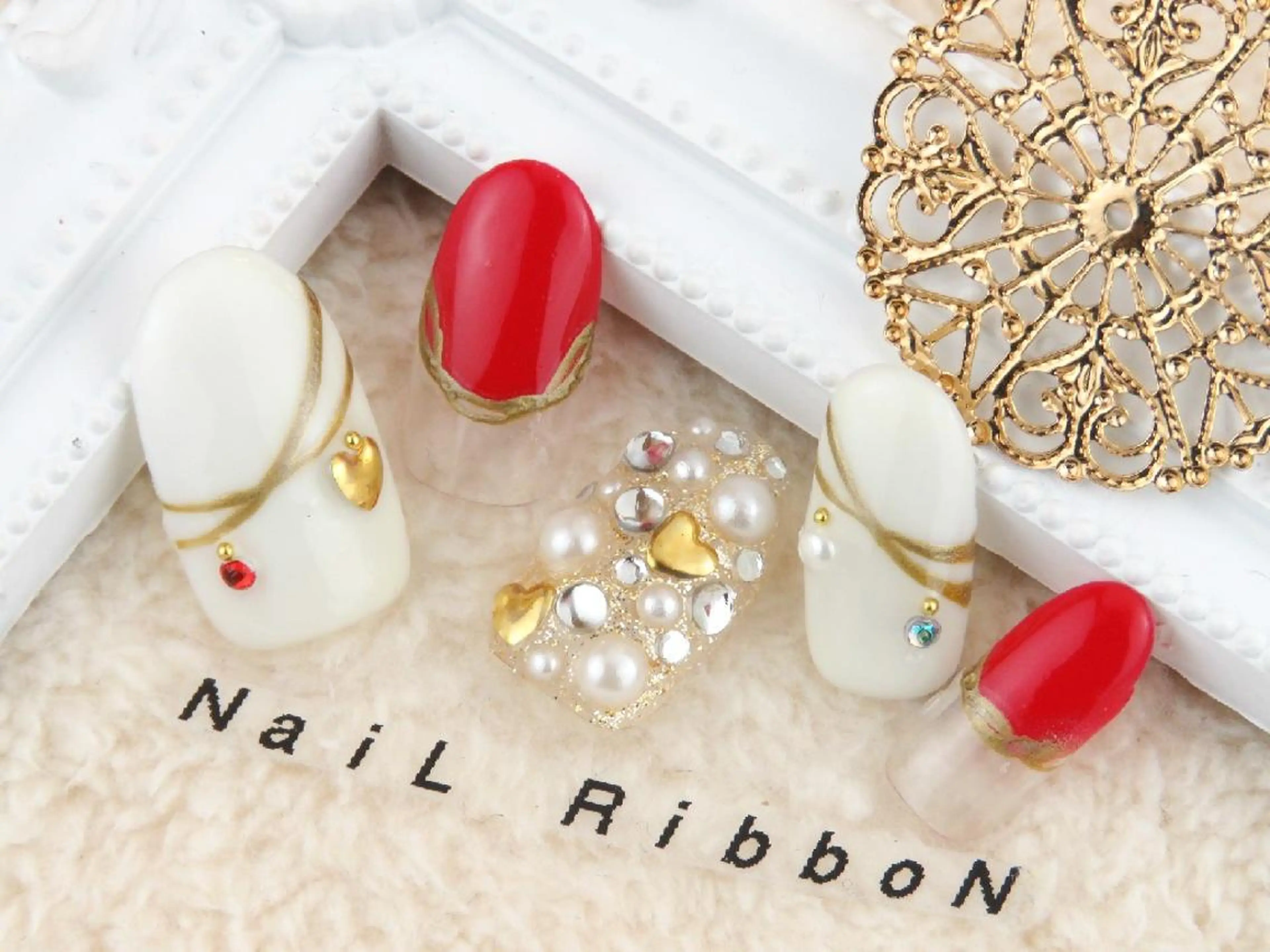 ネイル ネイルリボン 受付スタッフのネイルデザイン