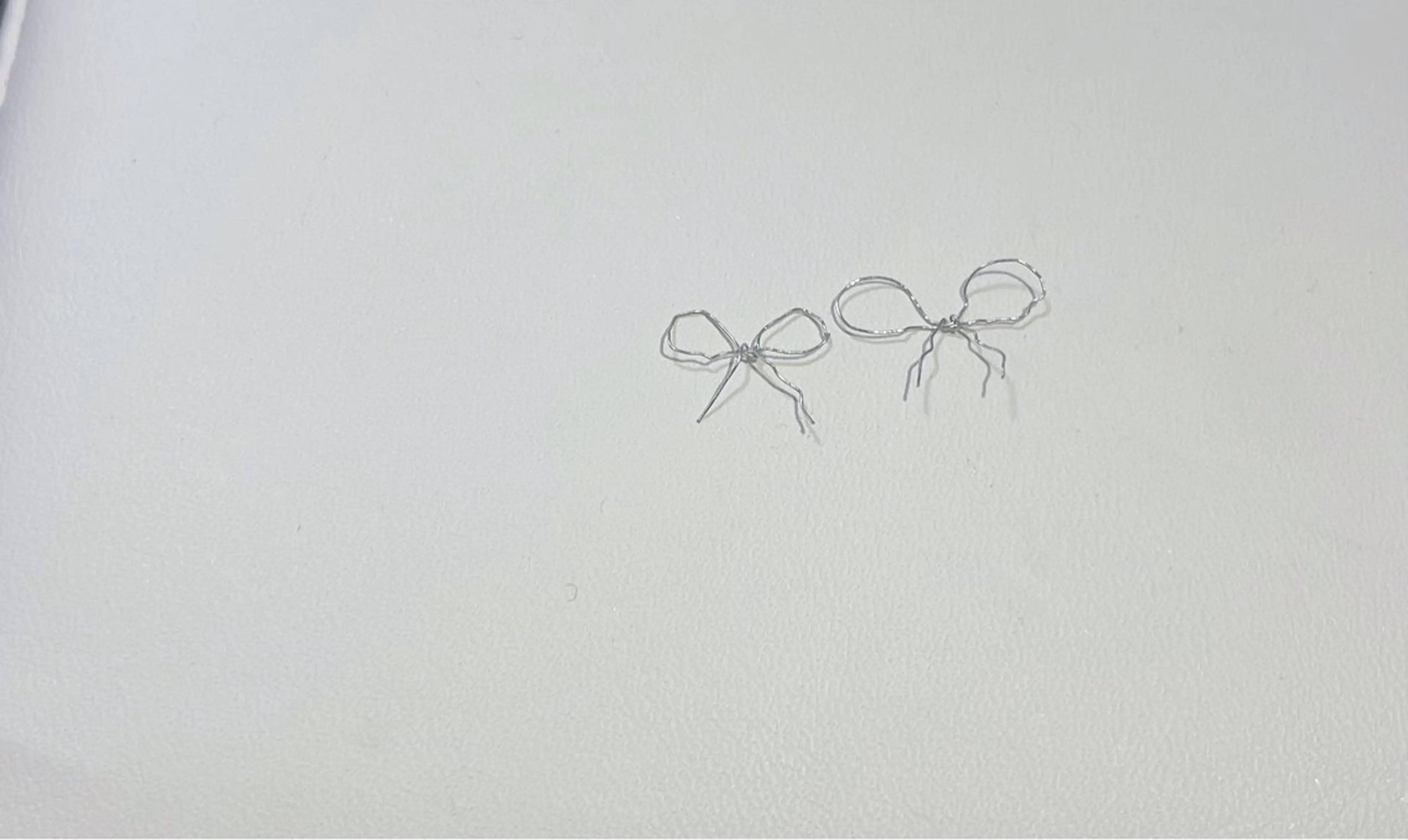 ネイル リボン 🦋y y Nail 🤍のネイルデザイン