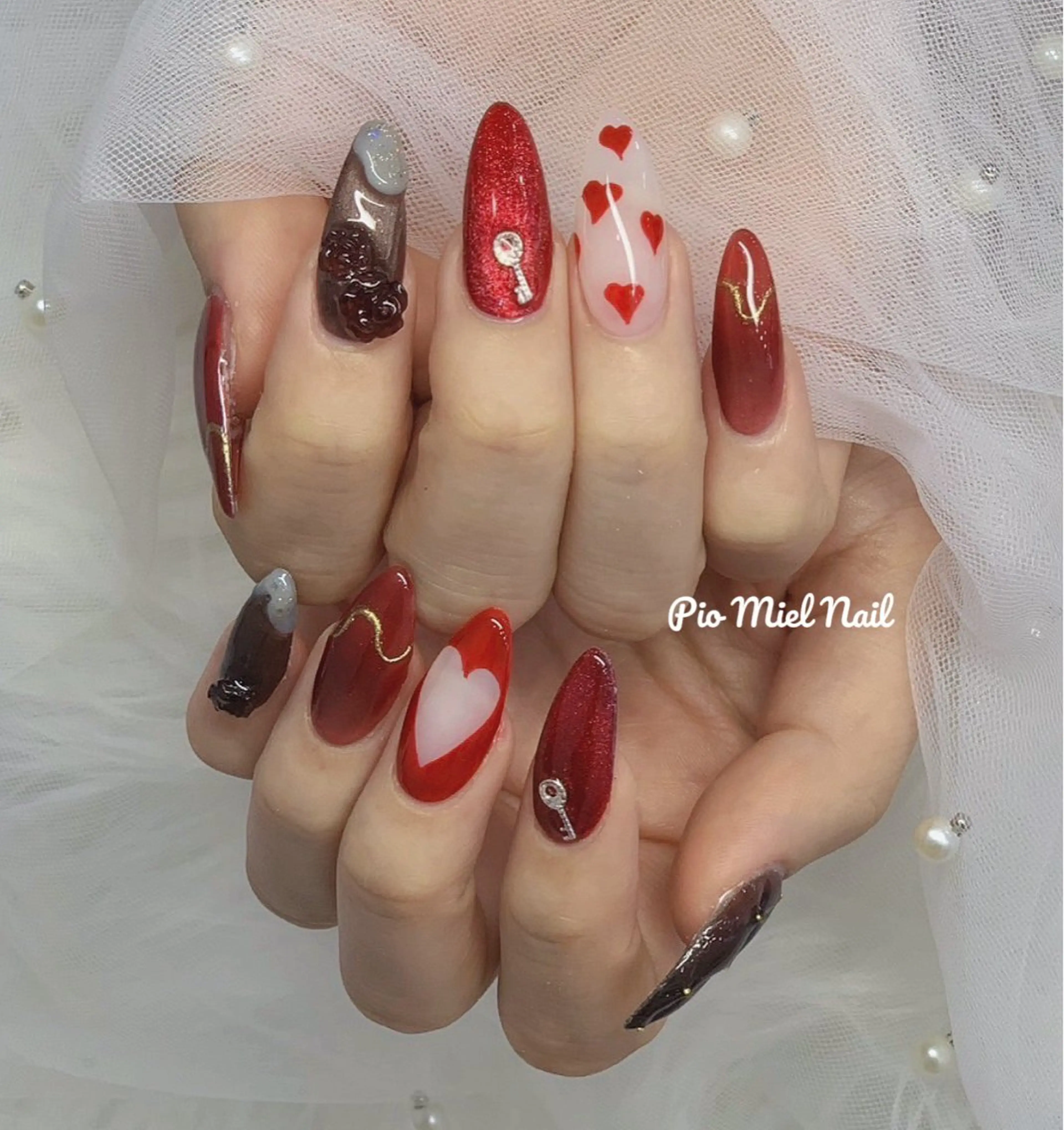 ネイル アートネイル ブラウン ジェルネイル グラデーション ハート ハンドネイル momo 長さだしのネイルデザイン