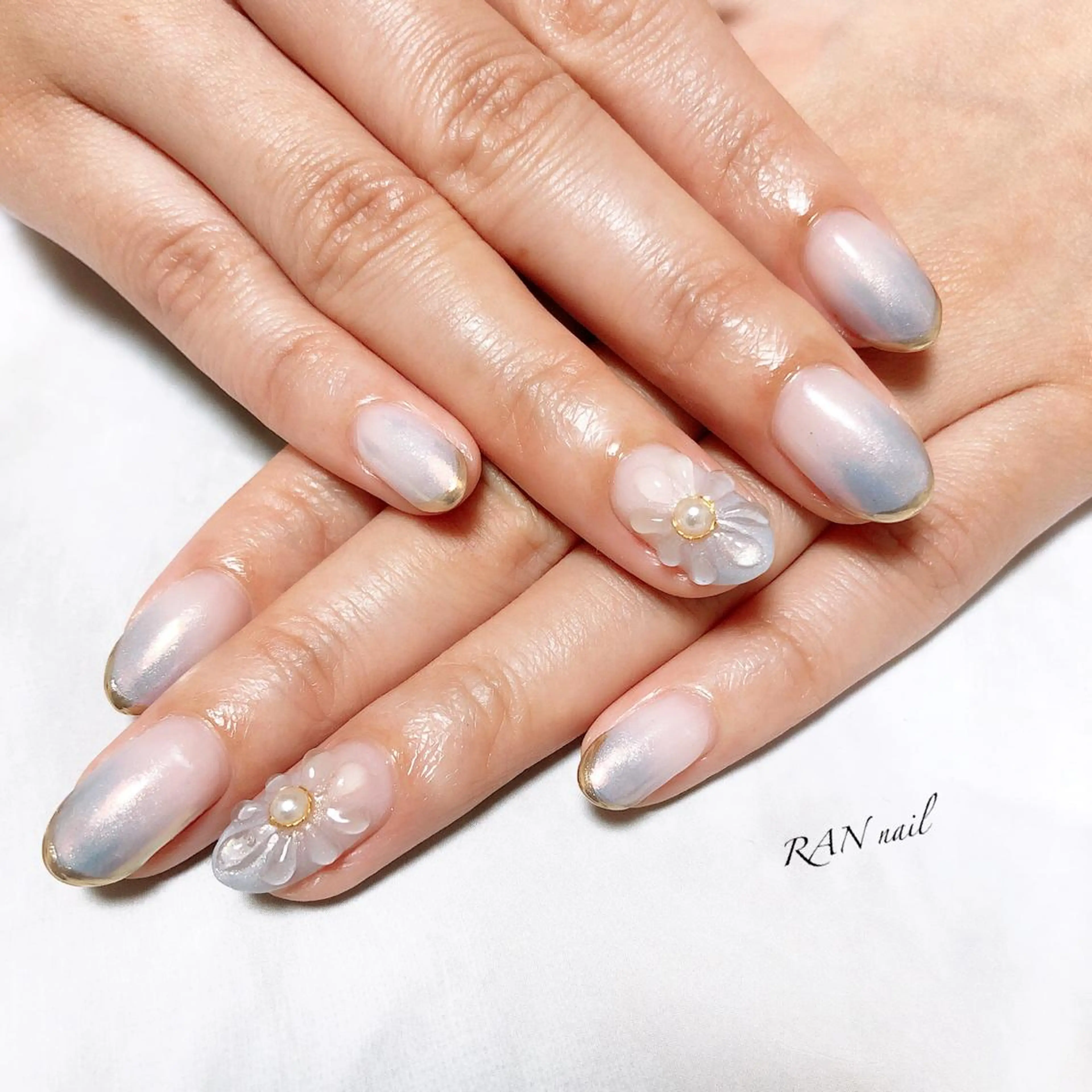 ネイル オーロラネイル ブルー フラワーネイル フットネイル キラキラネイル ハンドネイル フットネイル RAN nailのネイルデザイン