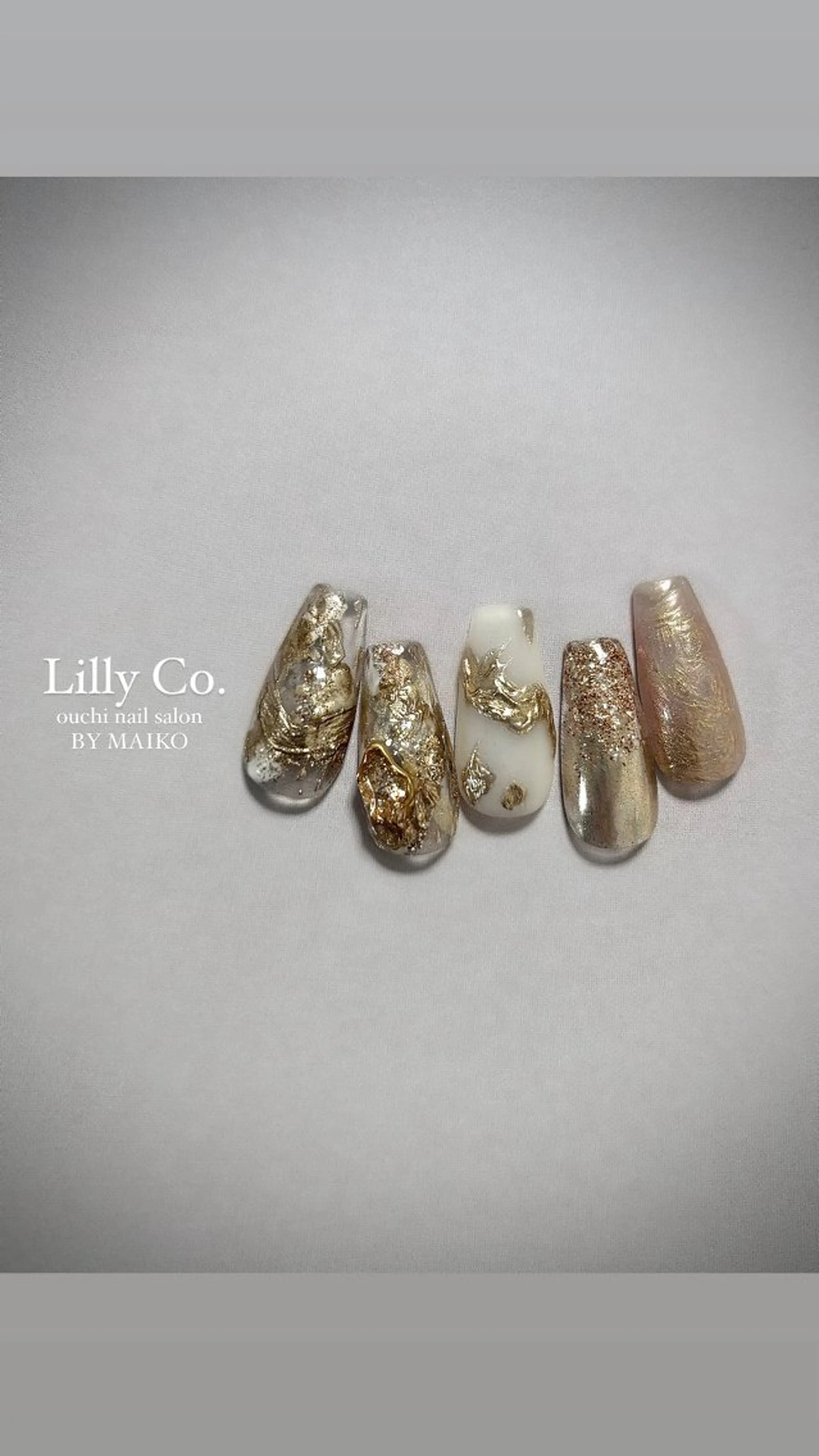 ネイル 入学式 ゴールド ニュアンスネイル 春ネイル ハンドネイル ハンドケア Lilly Co.のネイルデザイン