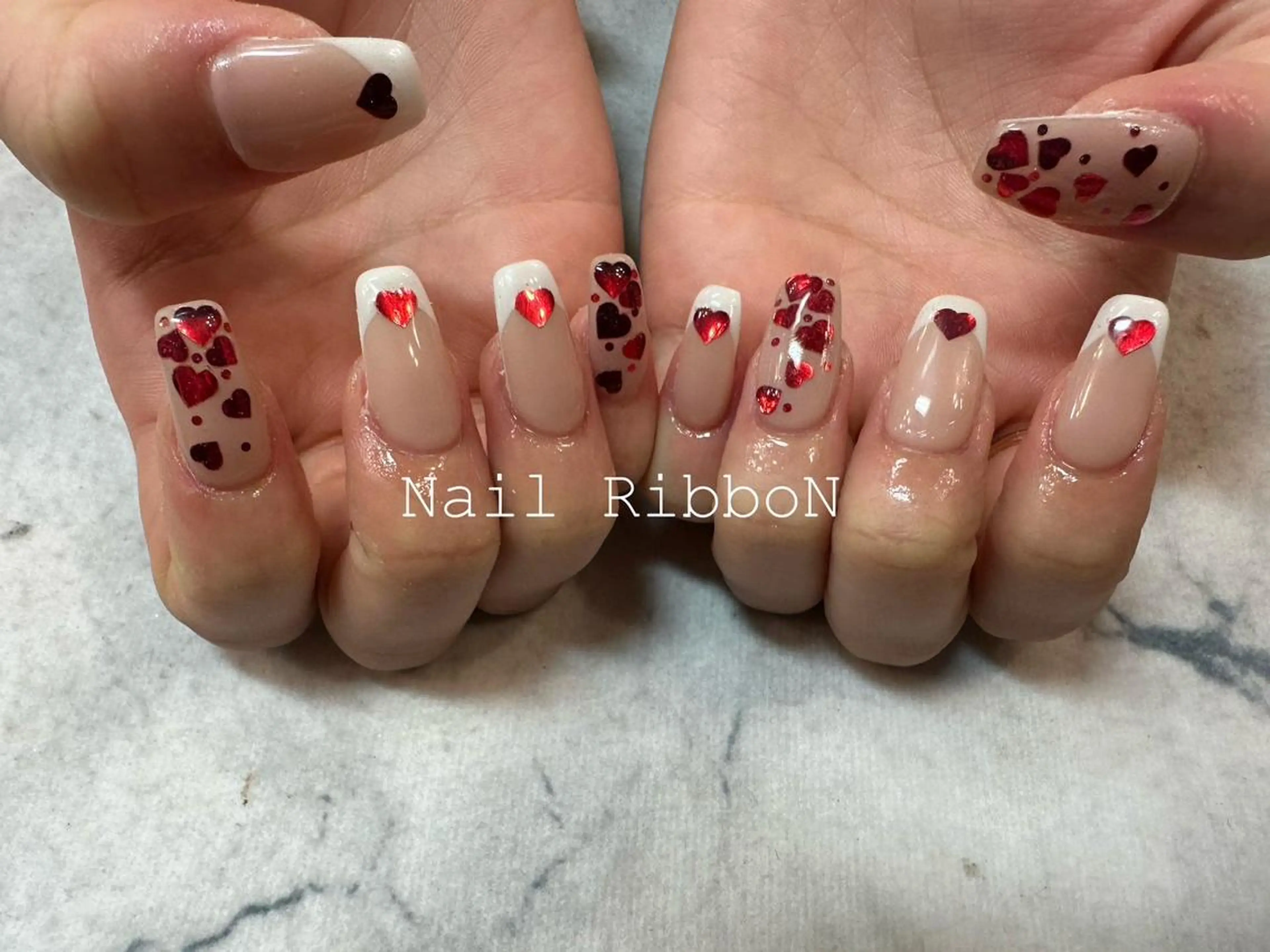 ネイル ネイルリボン 受付スタッフのネイルデザイン