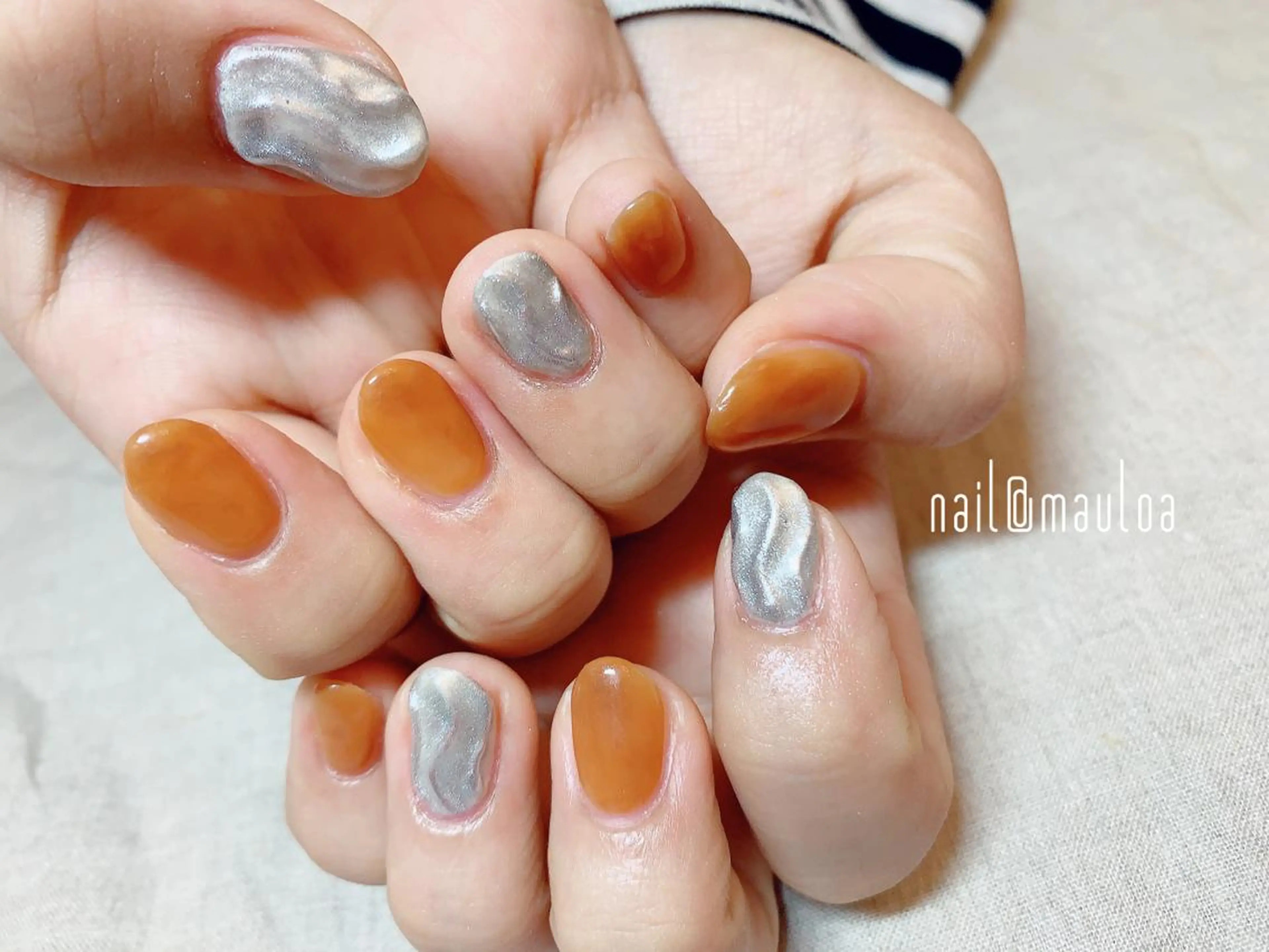 ネイル ミラーネイル ニュアンスネイル オレンジ pipi..所属・pipi ..のネイルデザイン