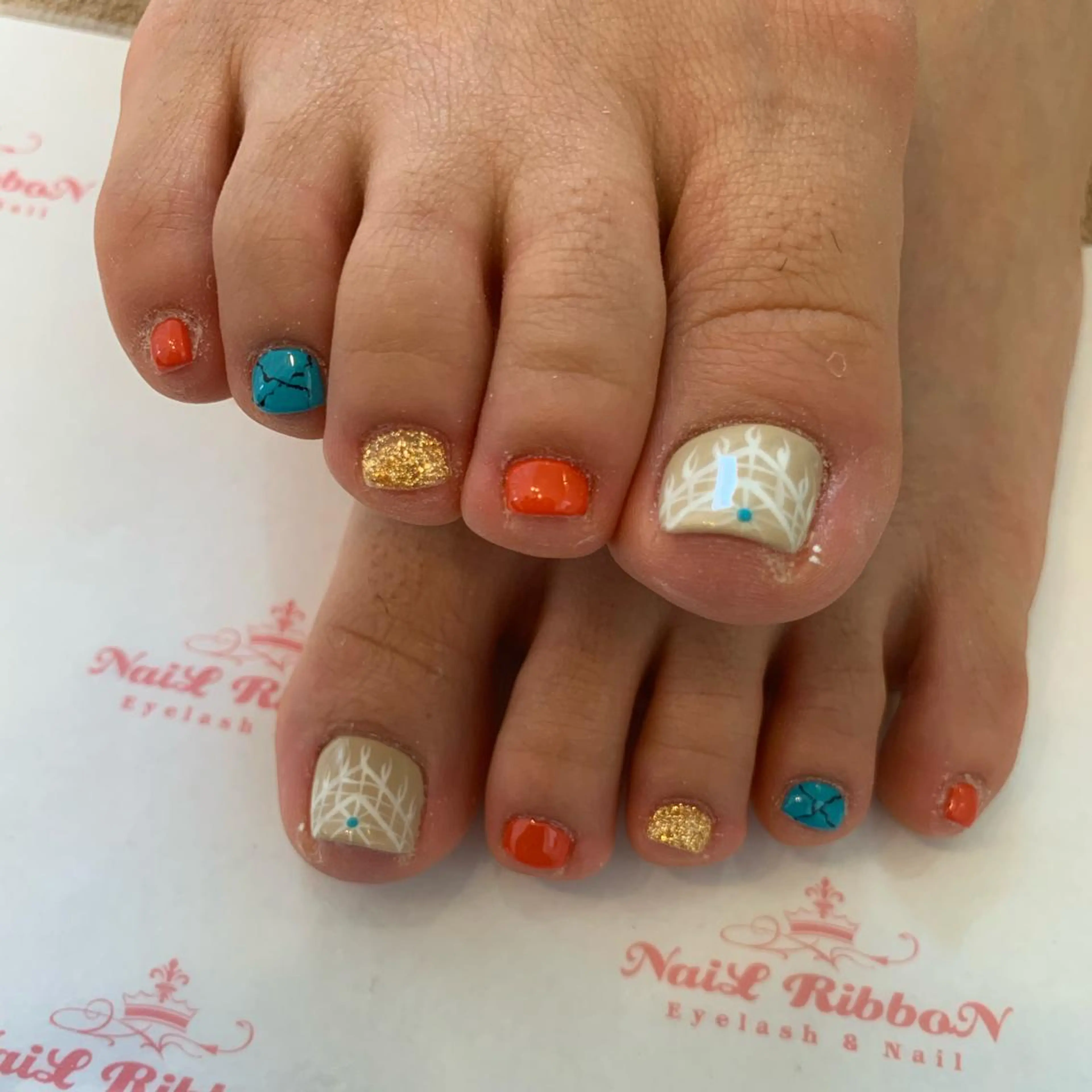 ネイル ネイルリボン 受付スタッフのネイルデザイン