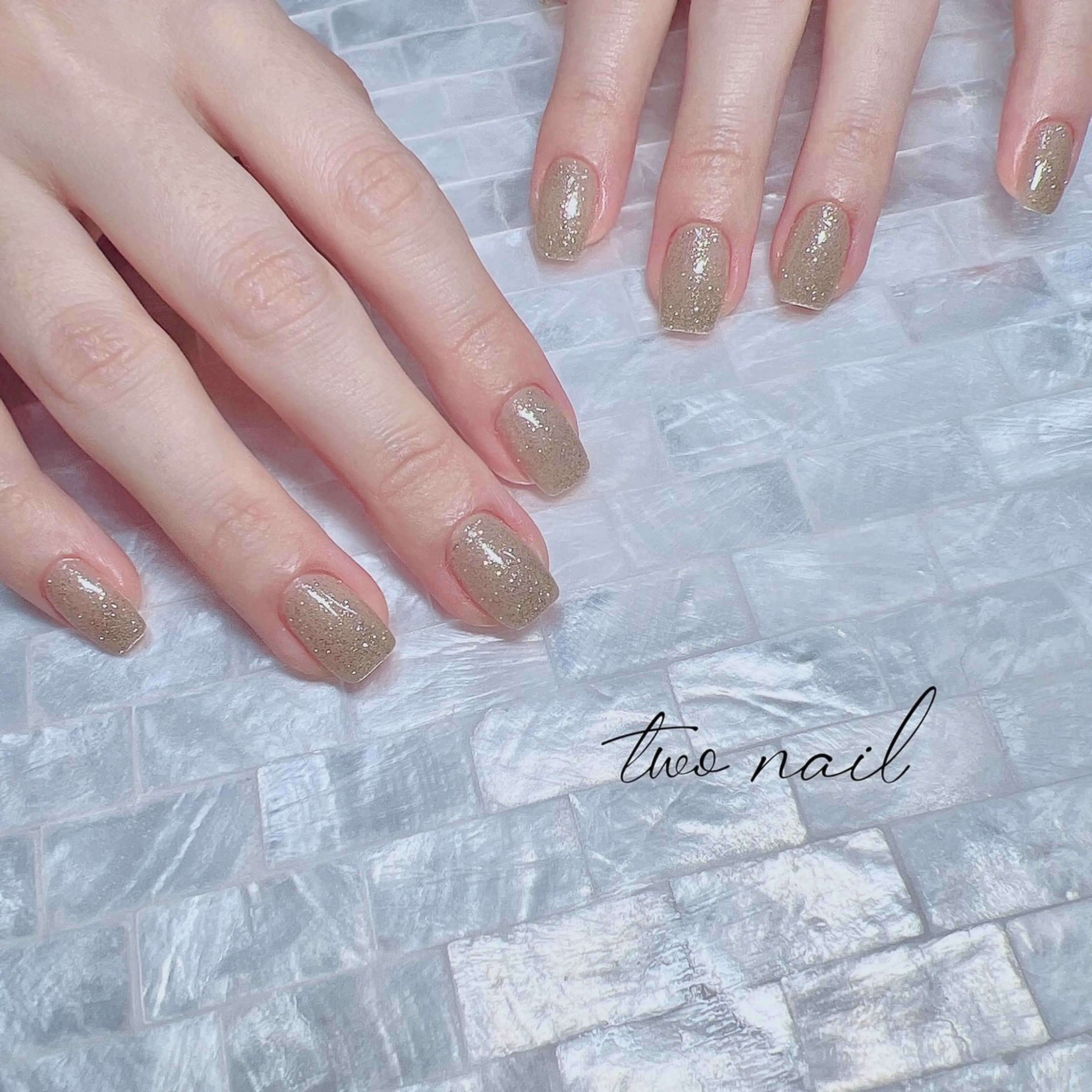 ネイル キラキラネイル ネイルチップ ホワイト ハンドネイル two nailのネイルデザイン