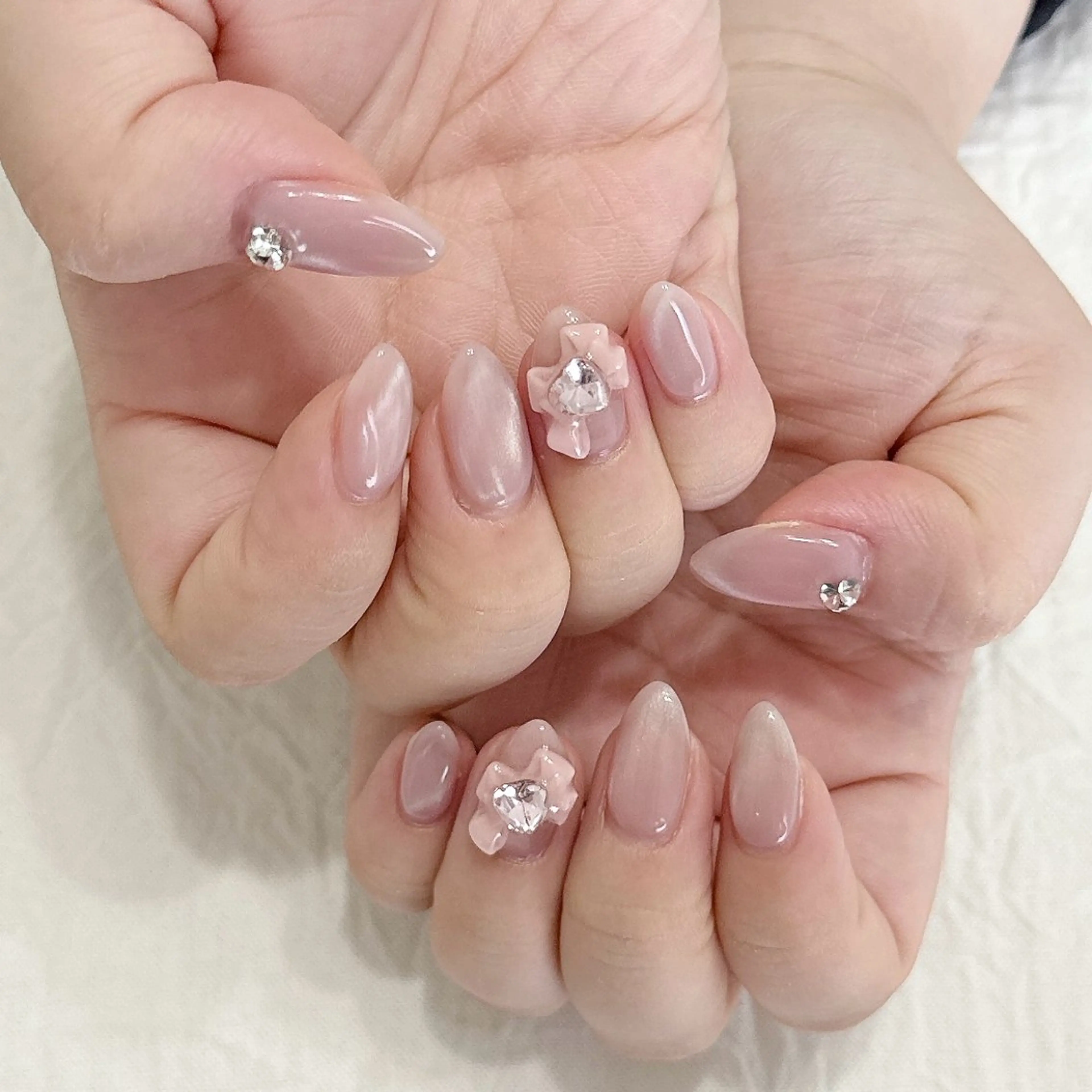 ネイル マグネットネイル ピンク リボン ストーンネイル ハンドネイル peaberry nailのネイルデザイン