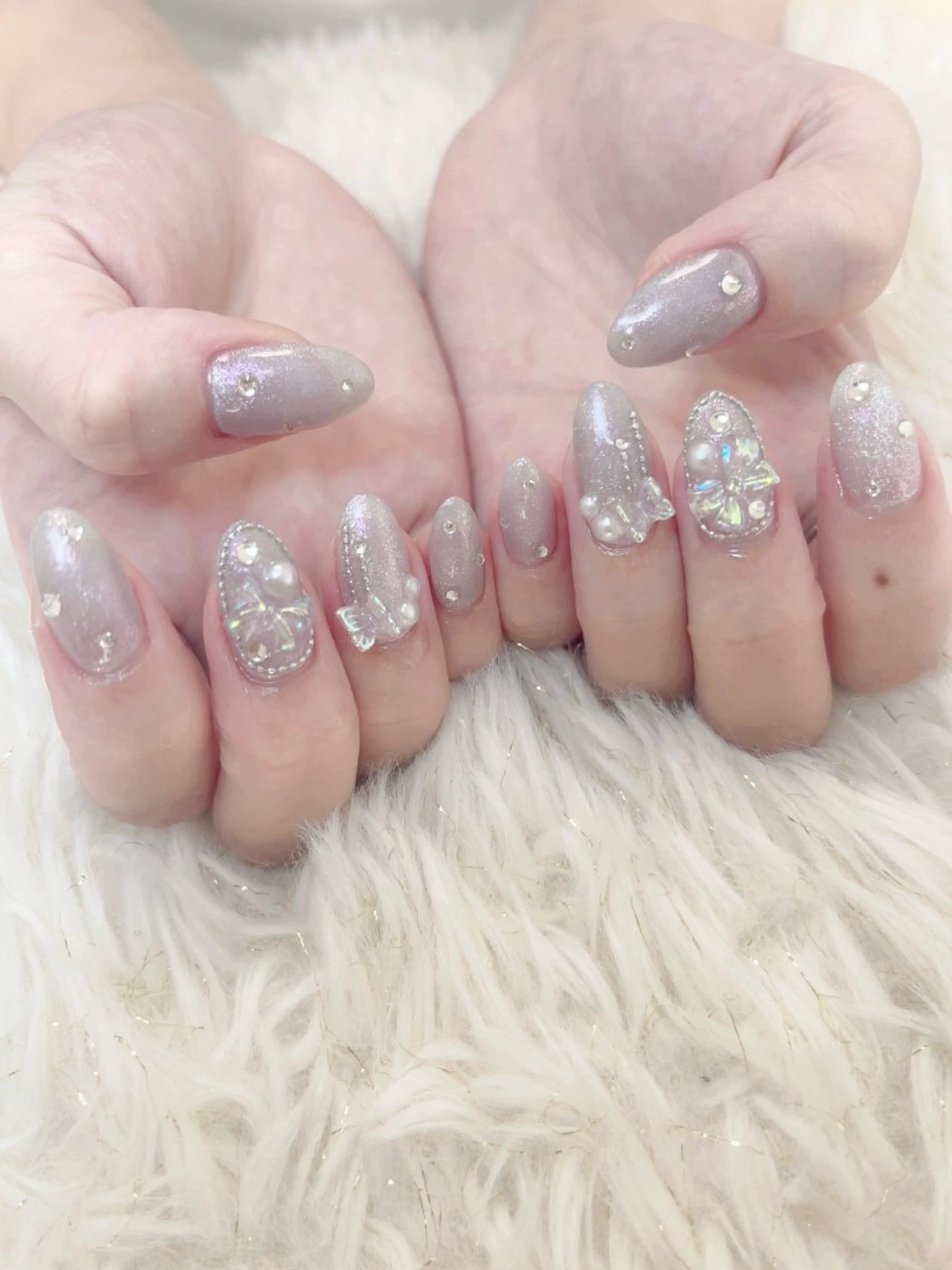 ネイル オーロラネイル マグネットネイル リボン ストーンネイル salon de Tiara 碧のネイルデザイン