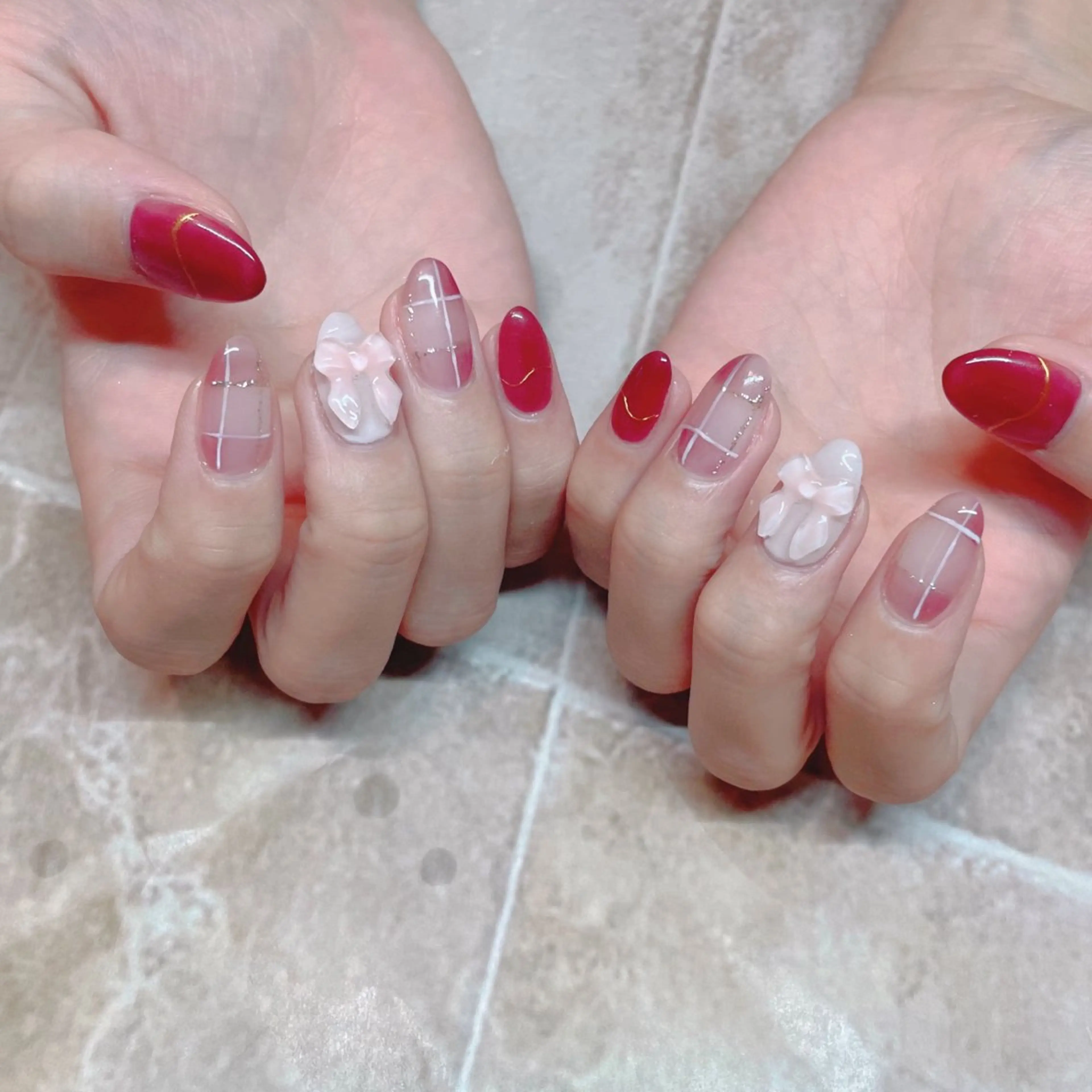 ネイル 赤色 リボン ハンドネイル Classy【クラッシー】所属・Classy: Mizukiのネイルデザイン