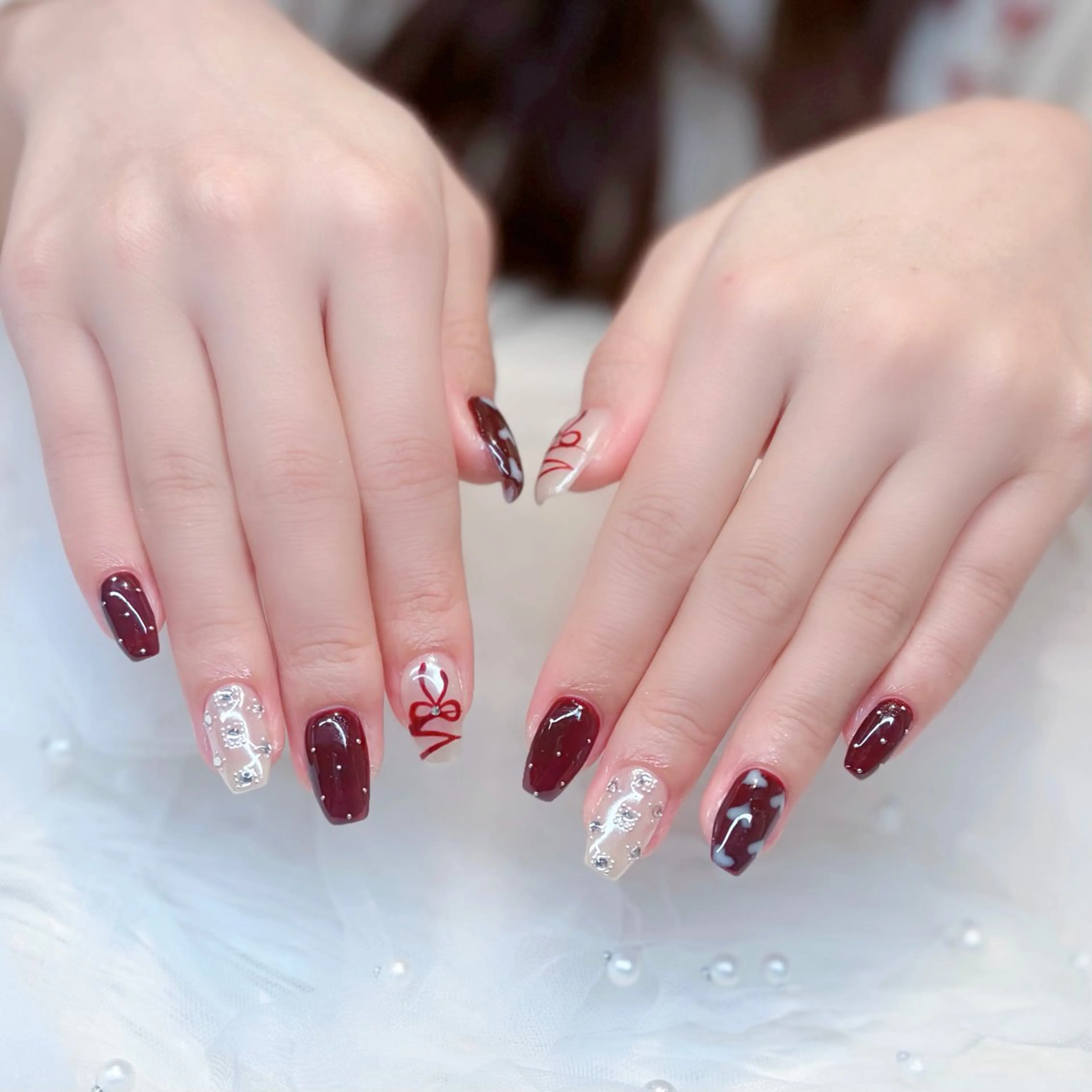 ネイル ガーリー ハート キラキラネイル 韓国ネイル リボン ハンドネイル ぷりゅねる 心斎橋のネイルデザイン