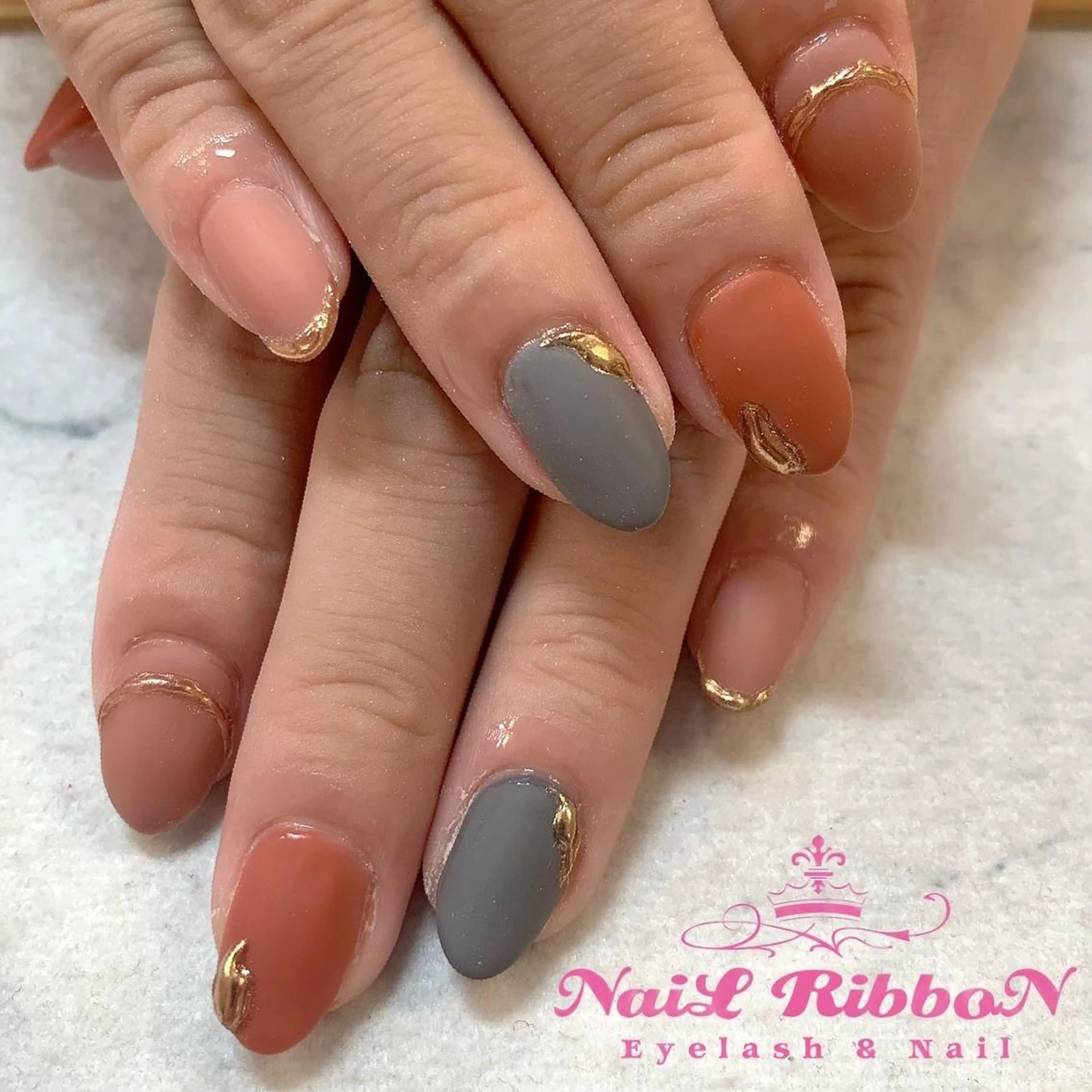 ネイル ネイルリボン 受付スタッフのネイルデザイン