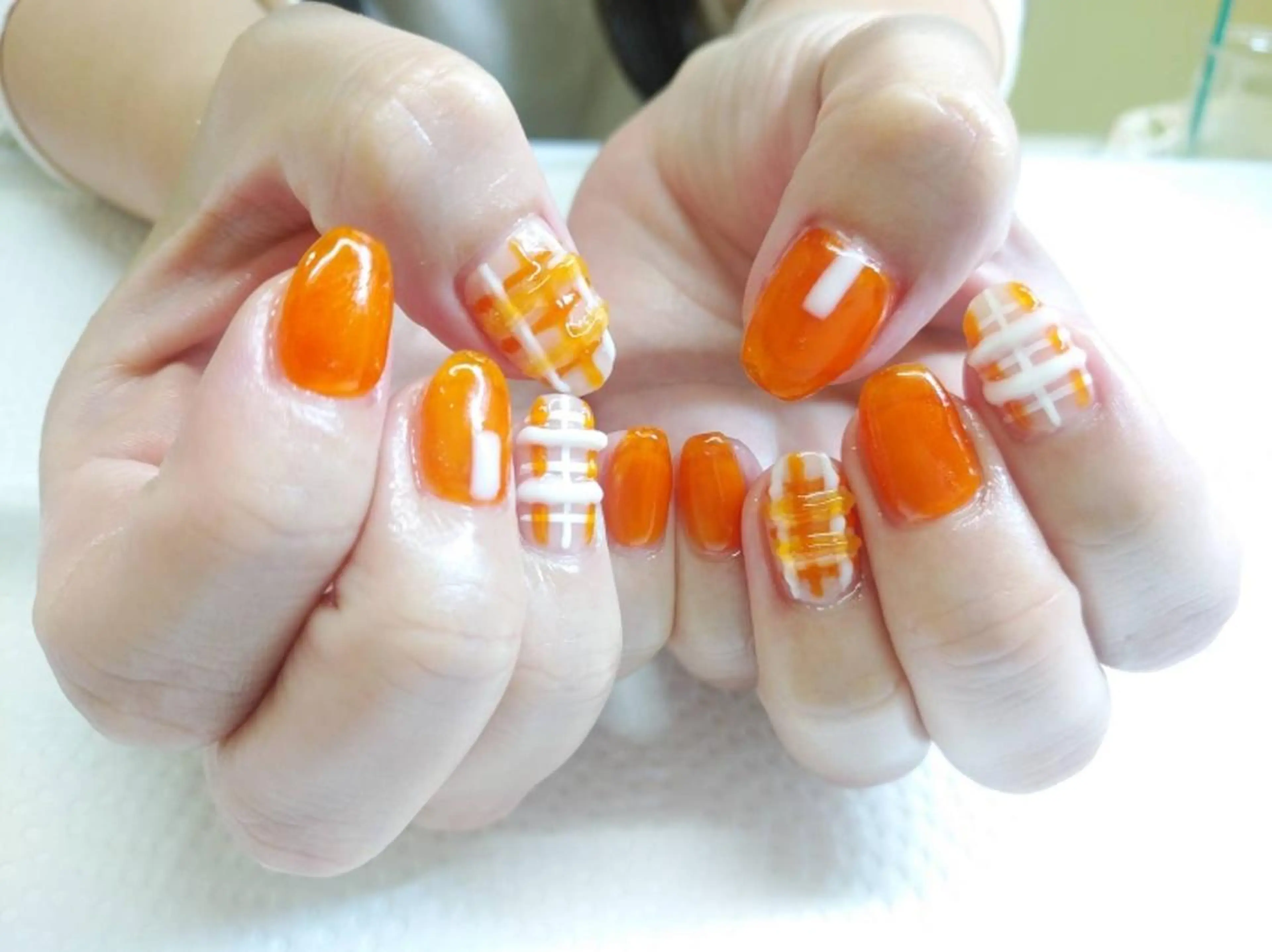 ネイル オレンジ ハンドネイル ハンドケア プライベートサロン RosyLily所属・プライベートサロン Rosy Lilyのネイルデザイン