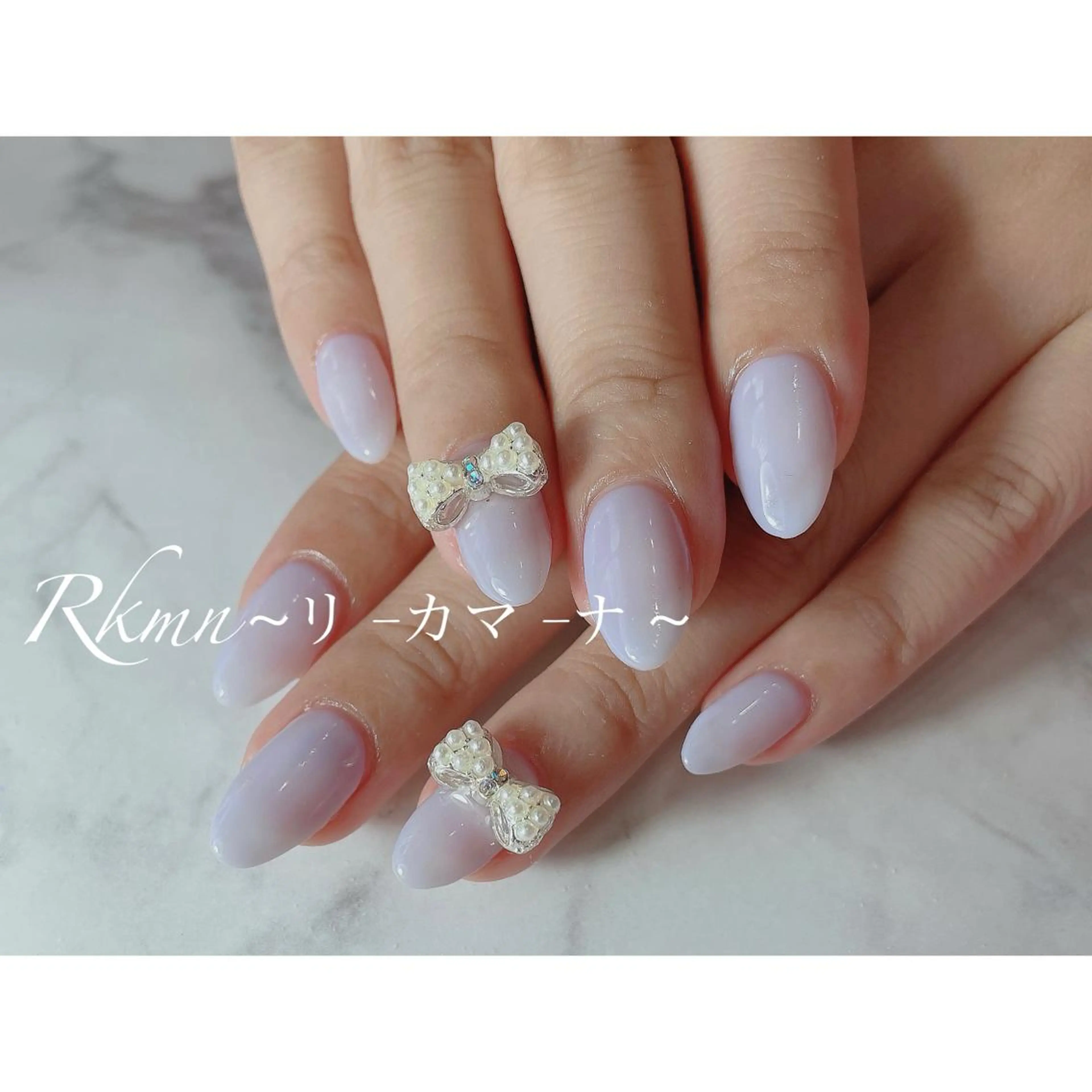 ネイル アートネイル ワンカラーネイル パープル リボン シンプルネイル ハンドネイル フットネイル ハンドケア Rkmn ~リ-カマ-ナ~のネイルデザイン