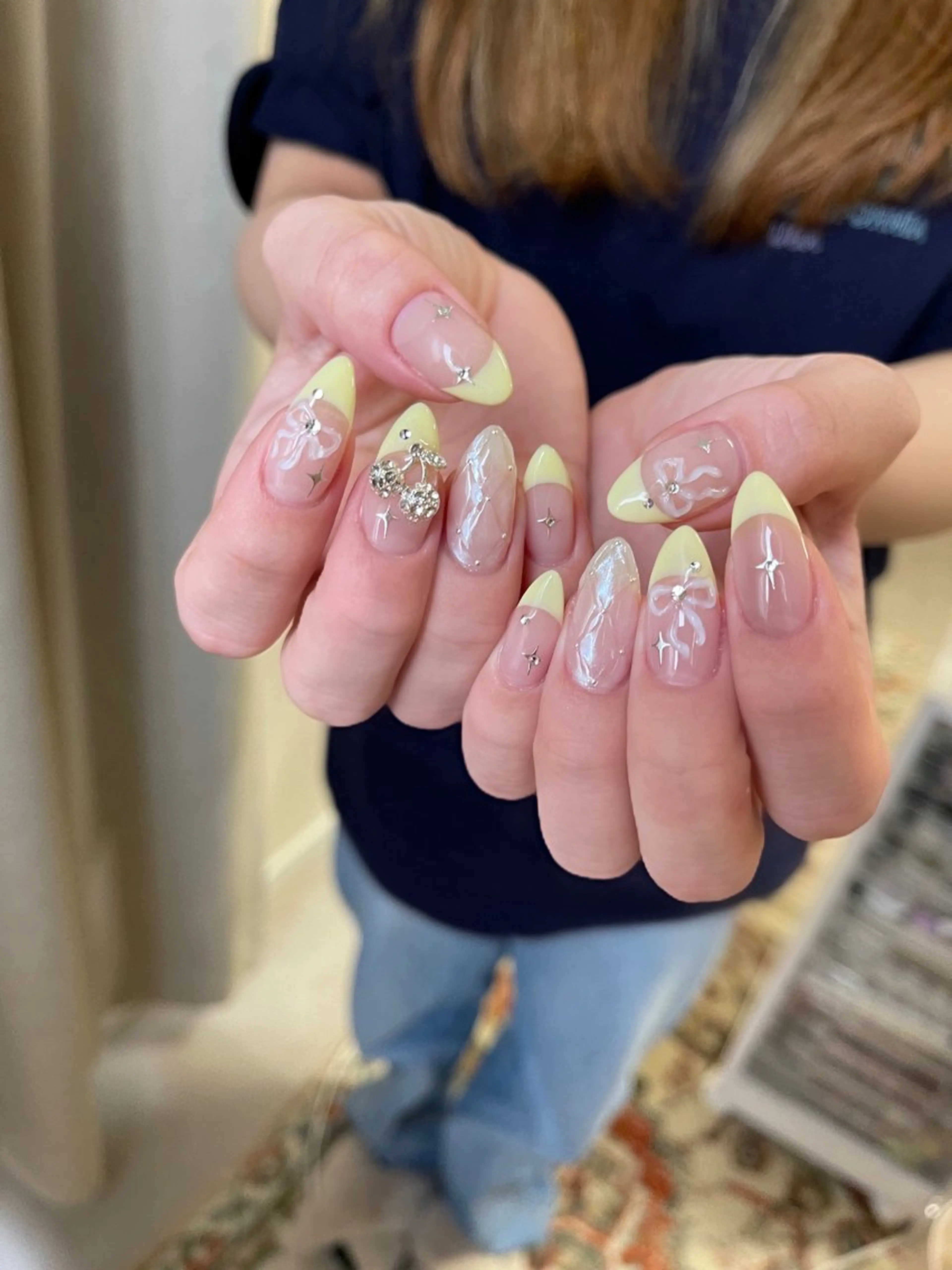 ネイル フレンチネイル リボン 黄色 Utopia nail_のネイルデザイン