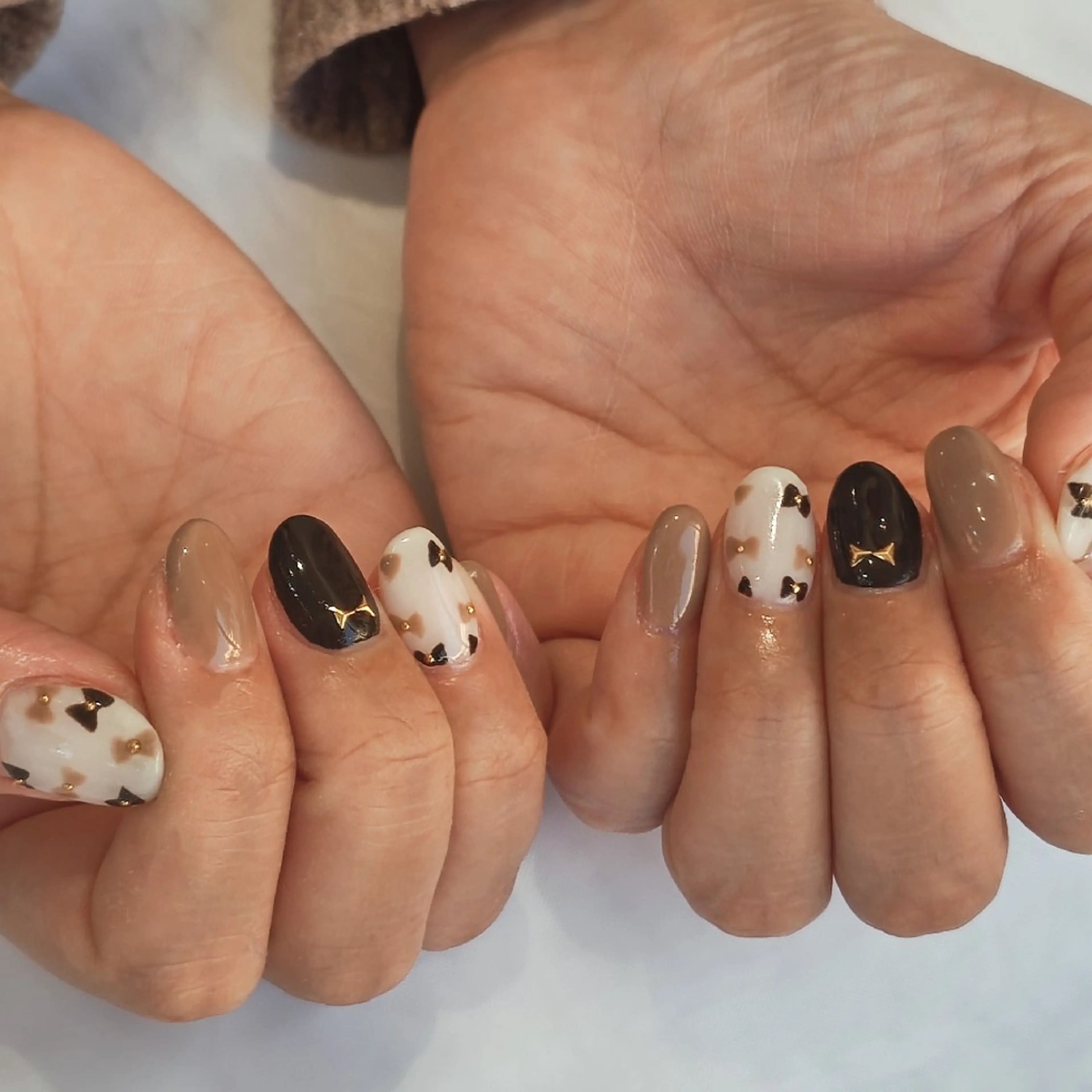 ネイル リボン ハンドネイル felicita fumi🩷のネイルデザイン
