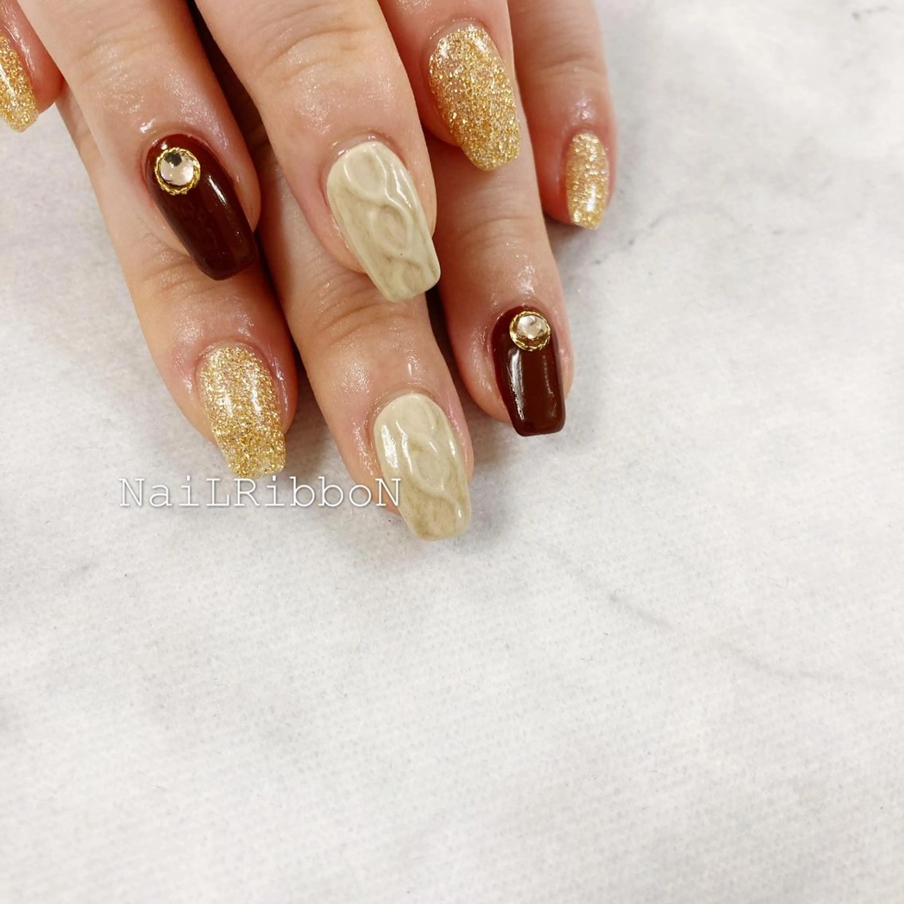 ネイル ネイルリボン 受付スタッフのネイルデザイン