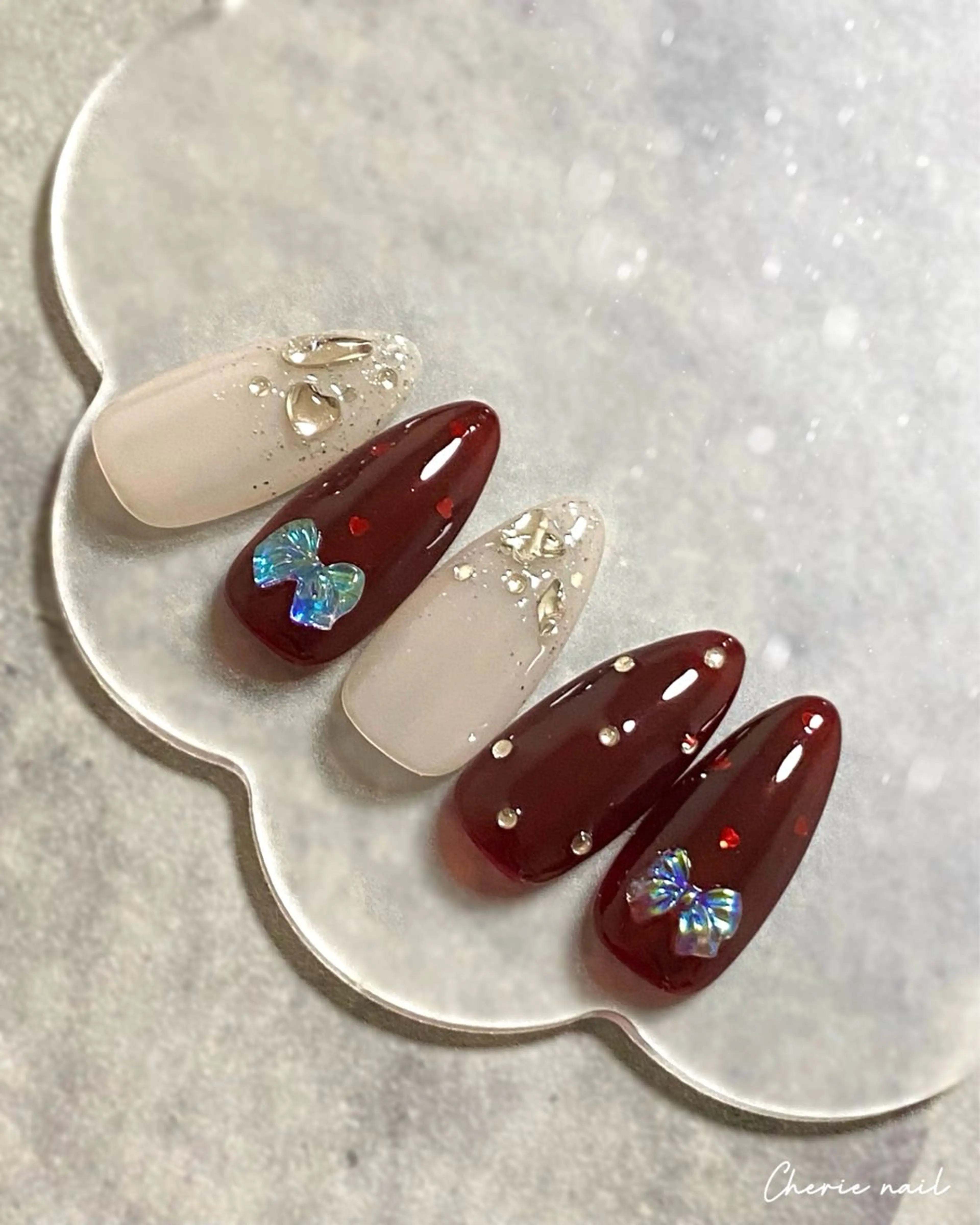 ネイル ボルドー ジェルネイル ハート ラメ(グリッター) リボン ハンドネイル Cherienail yunaのネイルデザイン