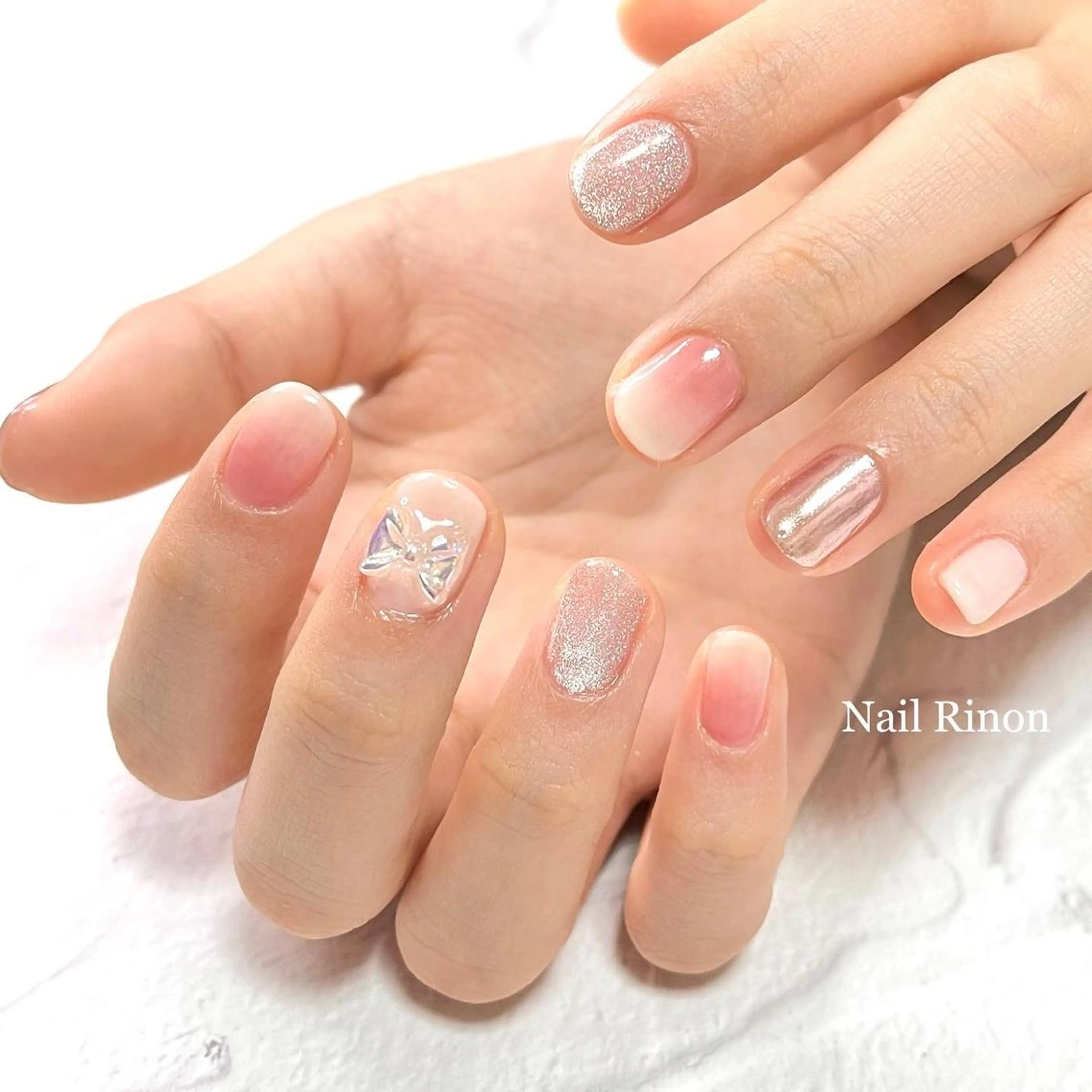 ネイル ピンク リボン ホワイト ハンドネイル Nail Rinonのネイルデザイン