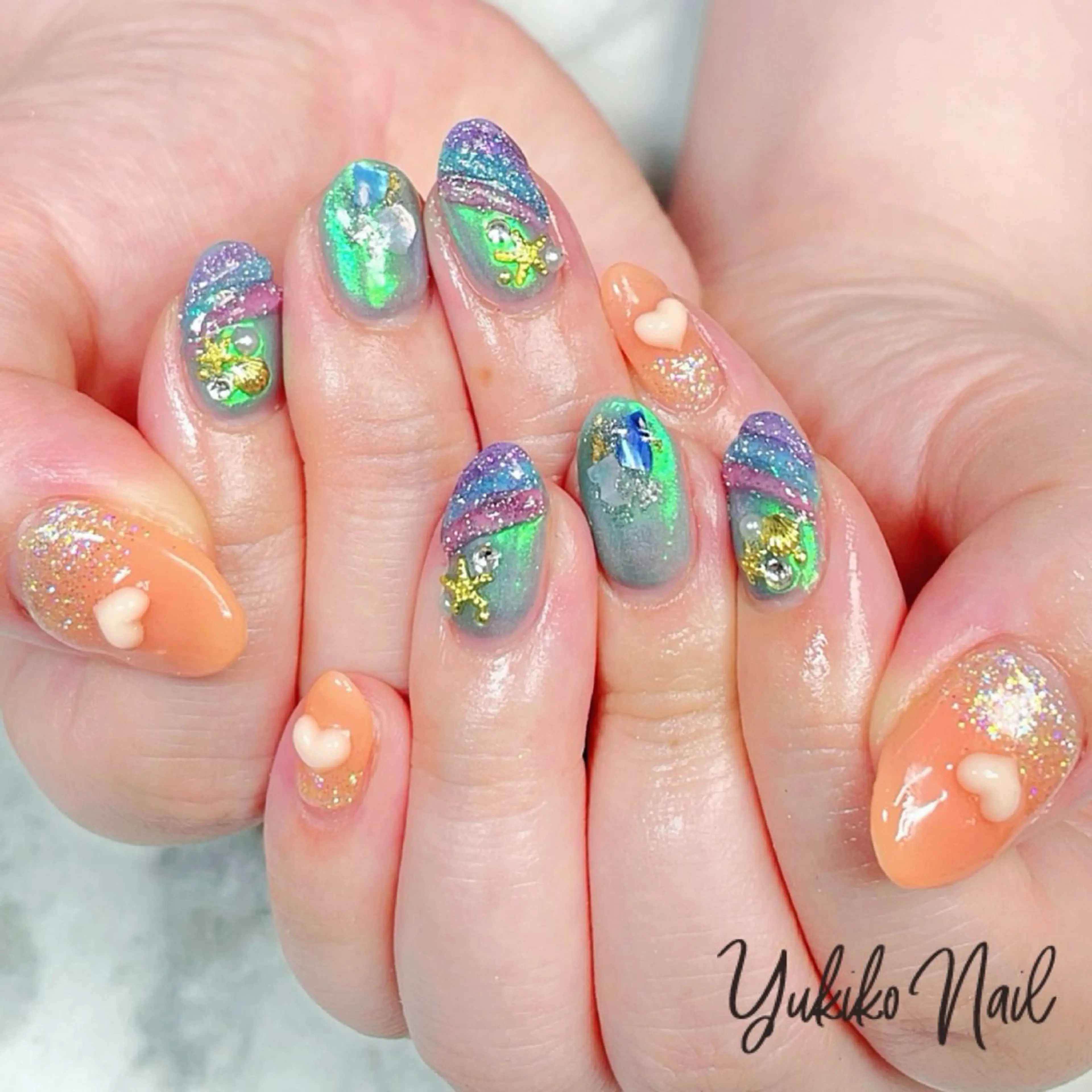 ネイル オーロラネイル キラキラネイル オレンジ 夏ネイル ユキコ ネイルのネイルデザイン