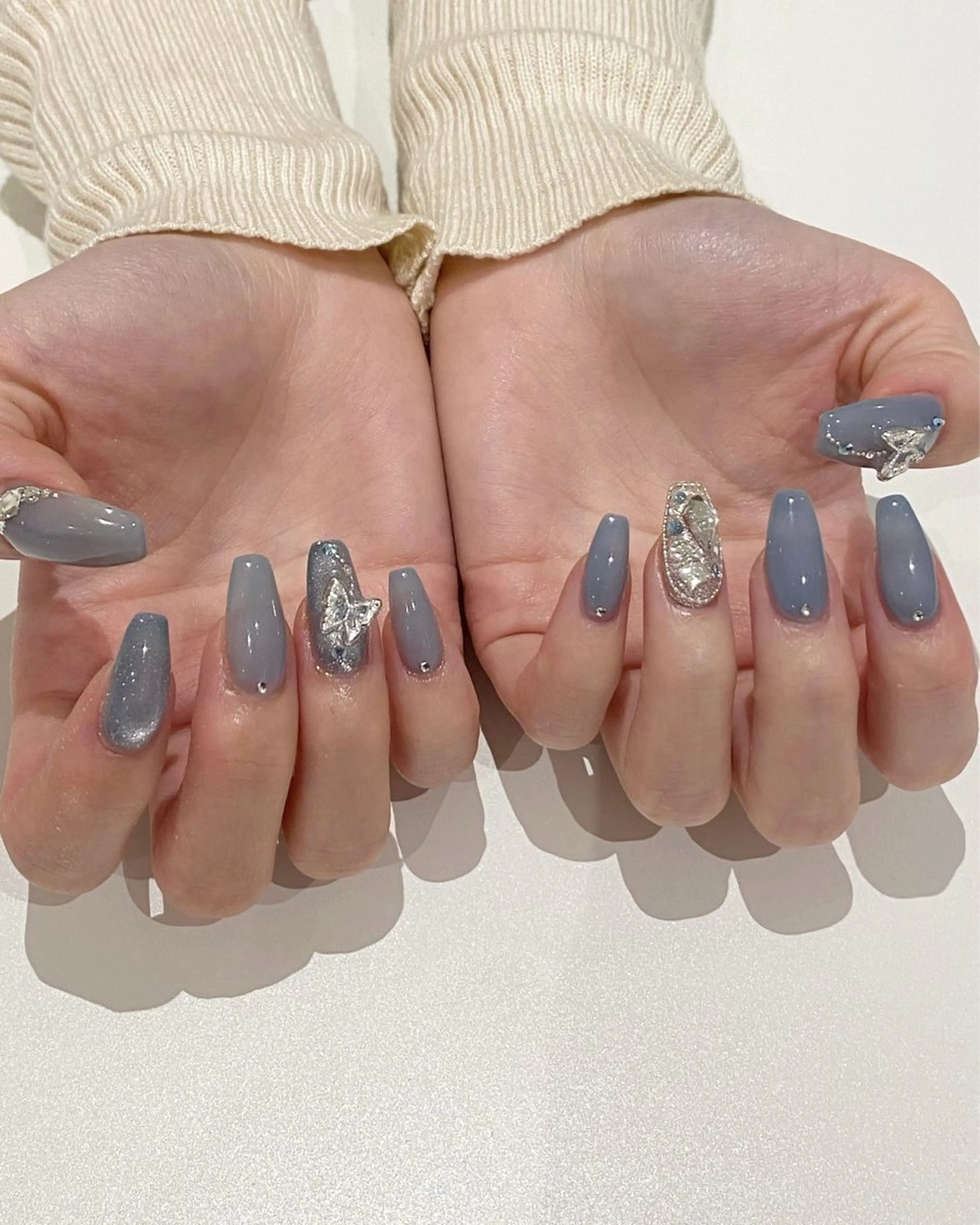 ネイル キラキラネイル 水色 ワンホンネイル melty 表参道 sakiのネイルデザイン