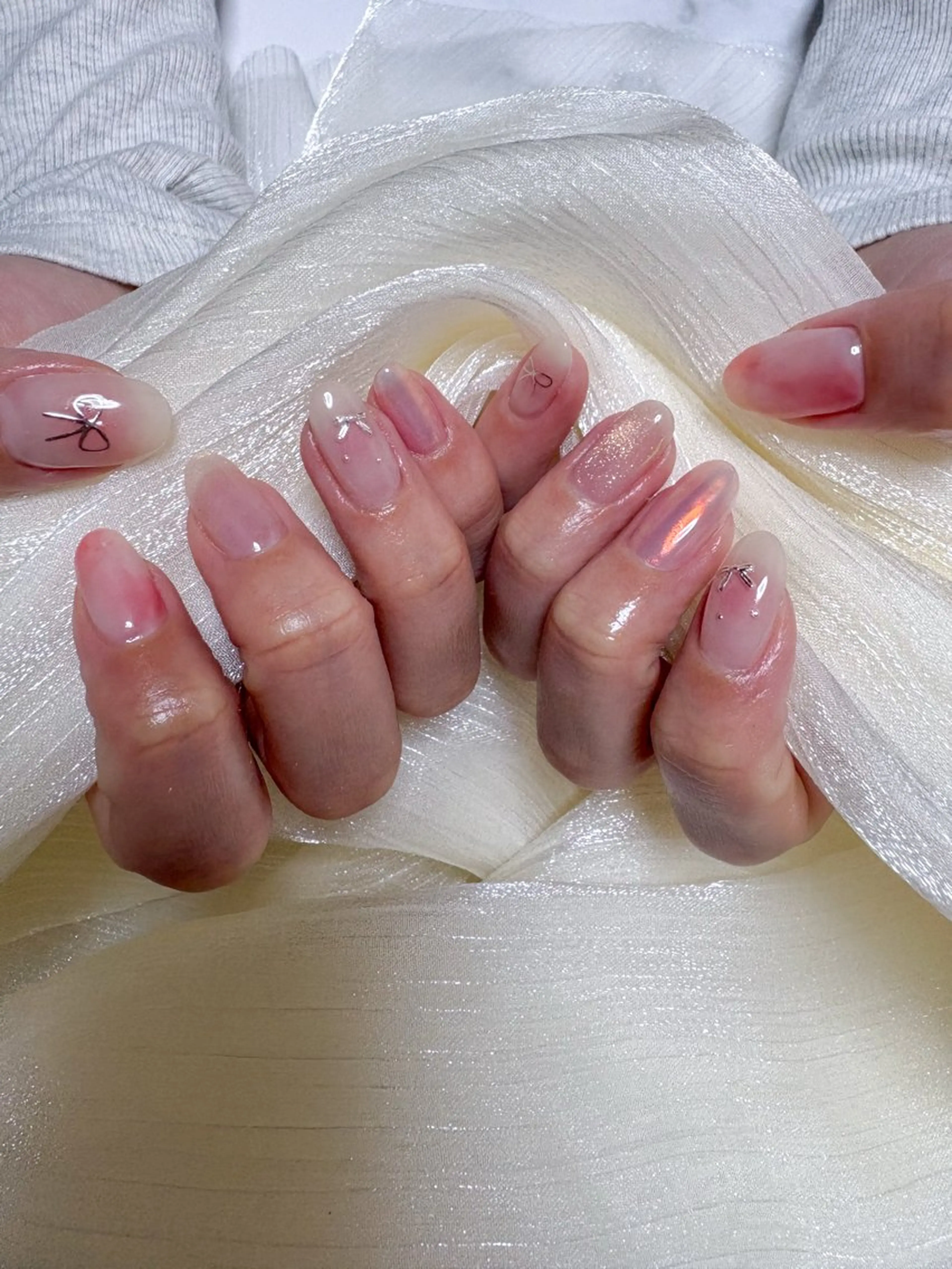 ネイル オーロラネイル ピンク リボン ハンドネイル nail salon minthのネイルデザイン