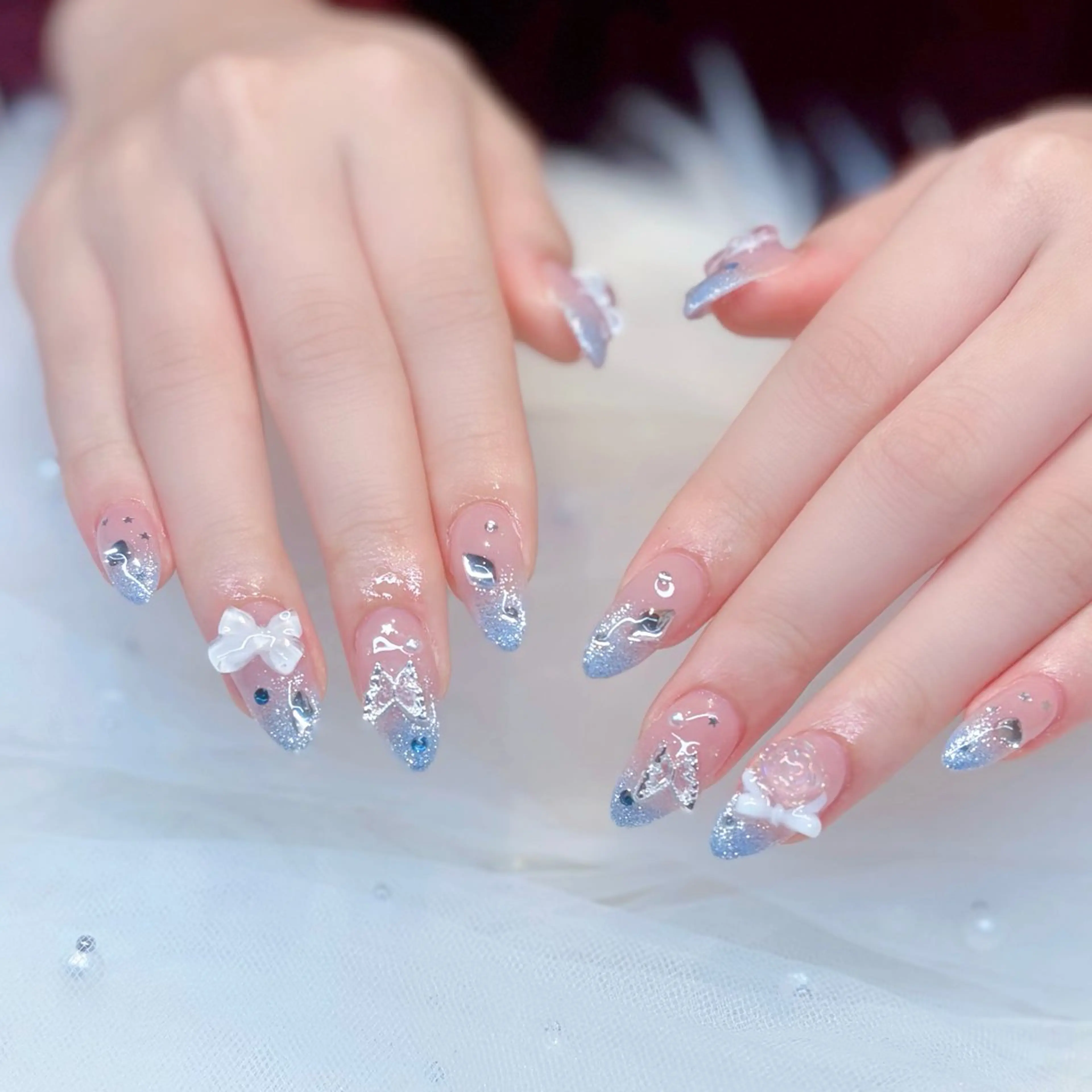 ネイル キラキラネイル リボン ワンホンネイル 冬ネイル ハンドネイル ぷりゅねる 心斎橋のネイルデザイン