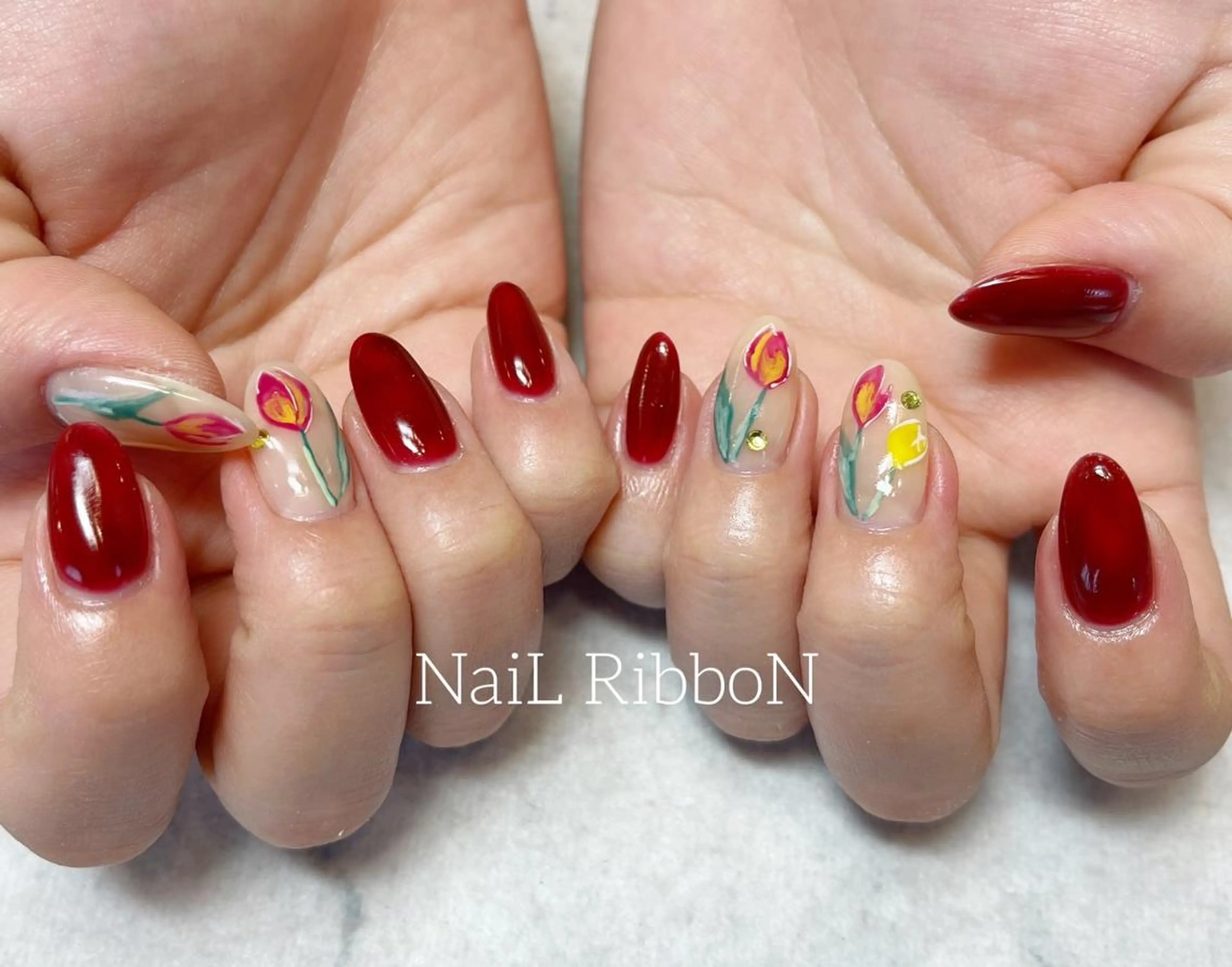 ネイル ネイルリボン 受付スタッフのネイルデザイン