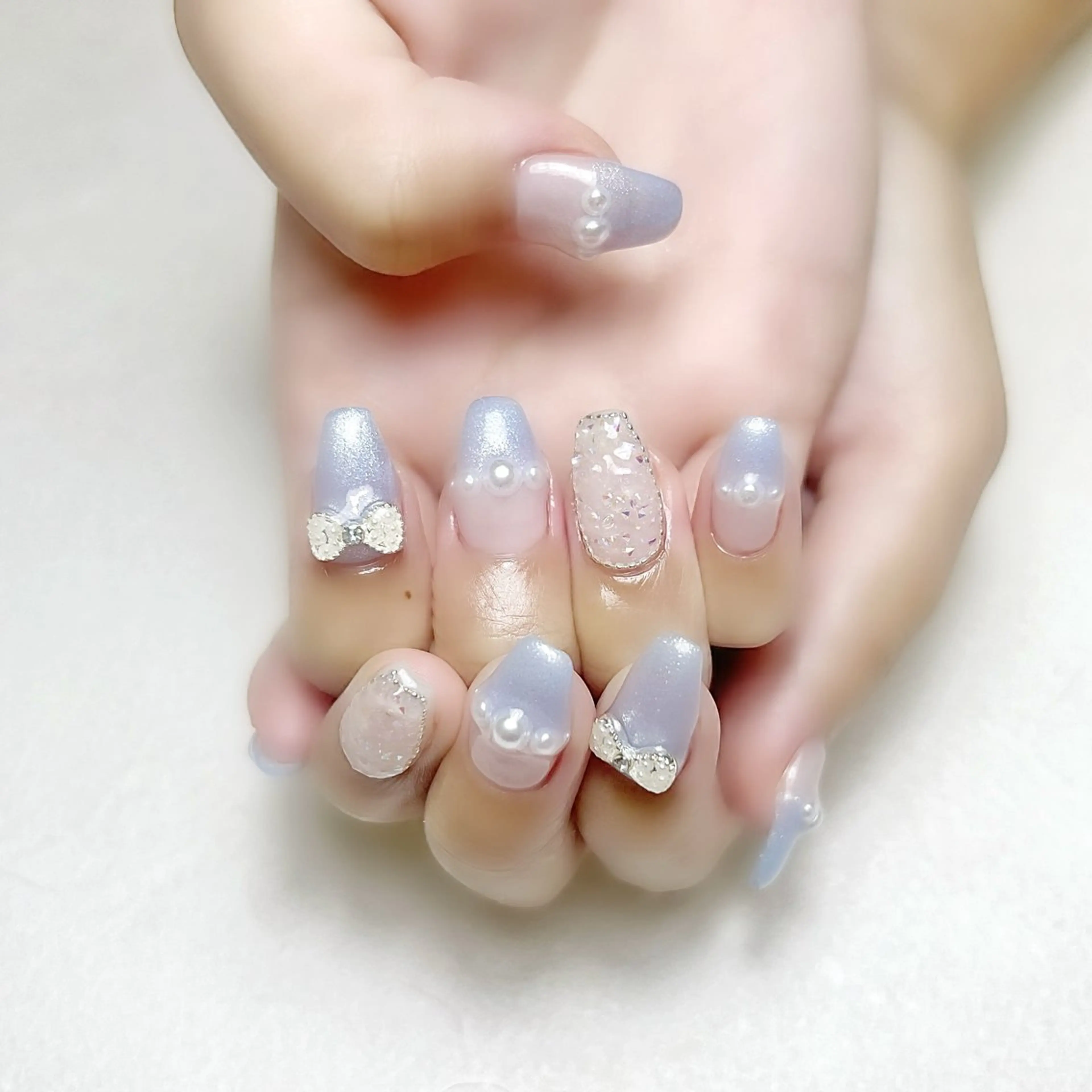 ネイル ガーリー 氷ネイル・うるうるネイル キラキラネイル 水色 夏ネイル rouse nail RISATOのネイルデザイン